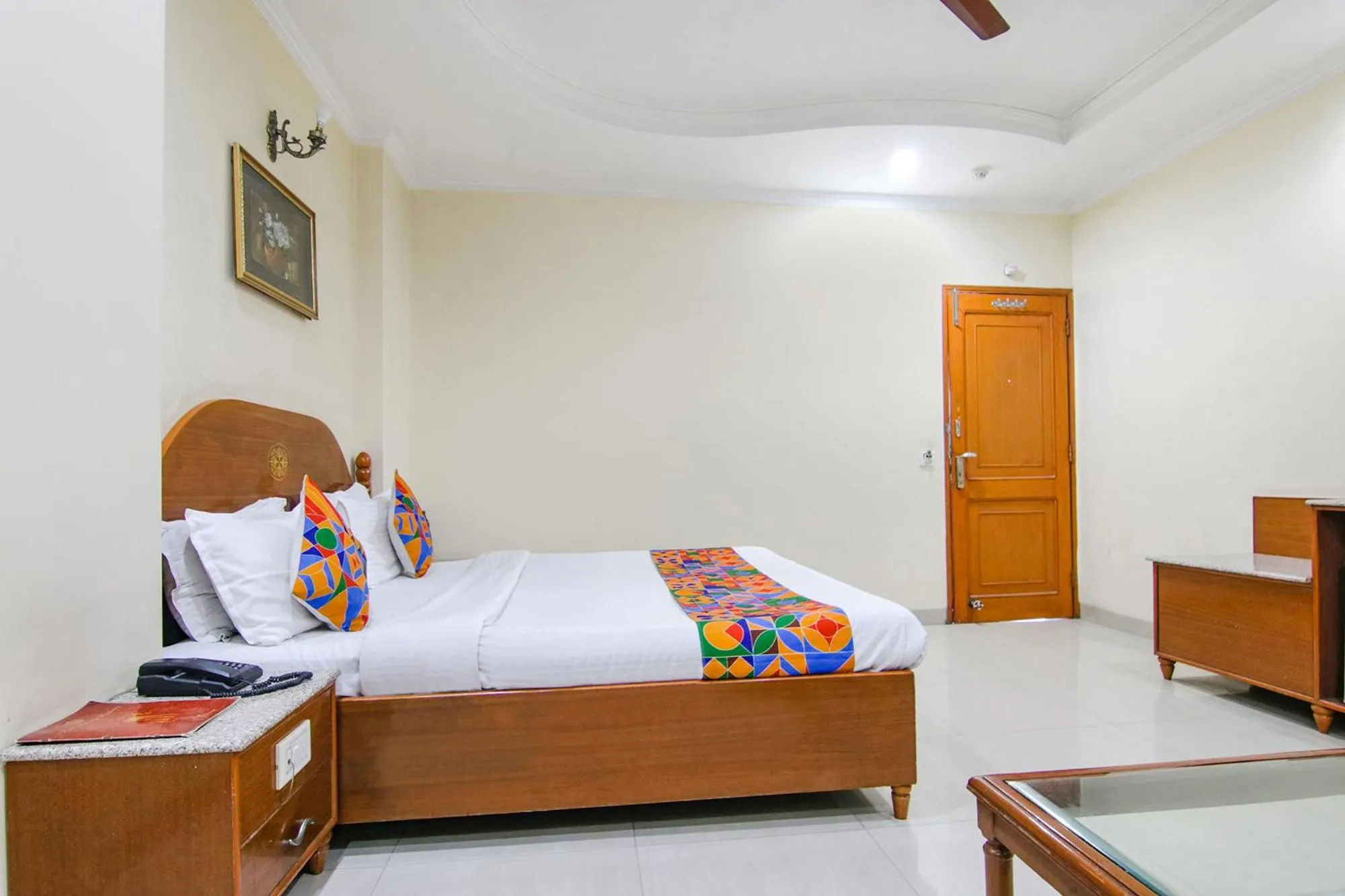Bed in FabHotel CS Jalandhar