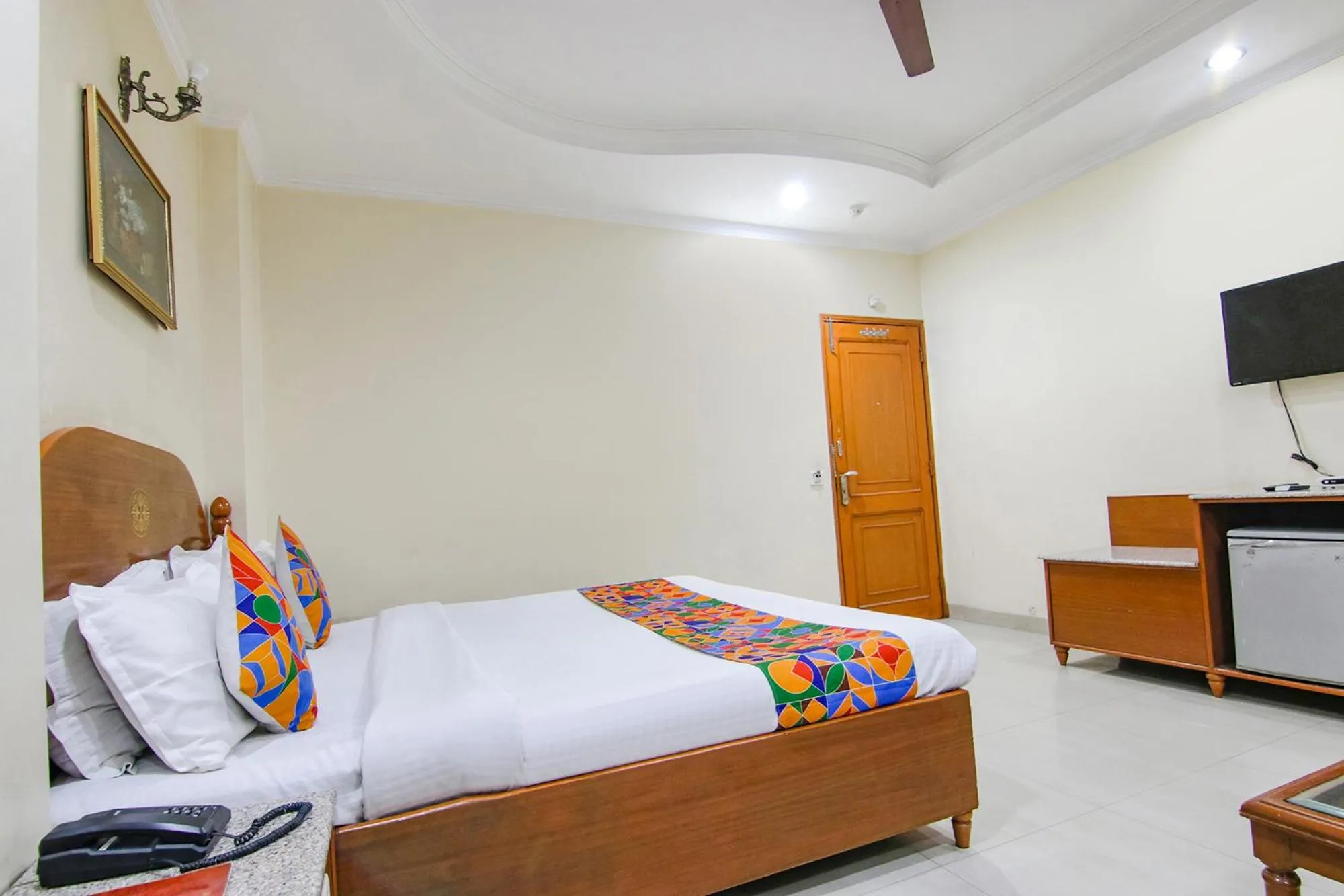 Bed in FabHotel CS Jalandhar