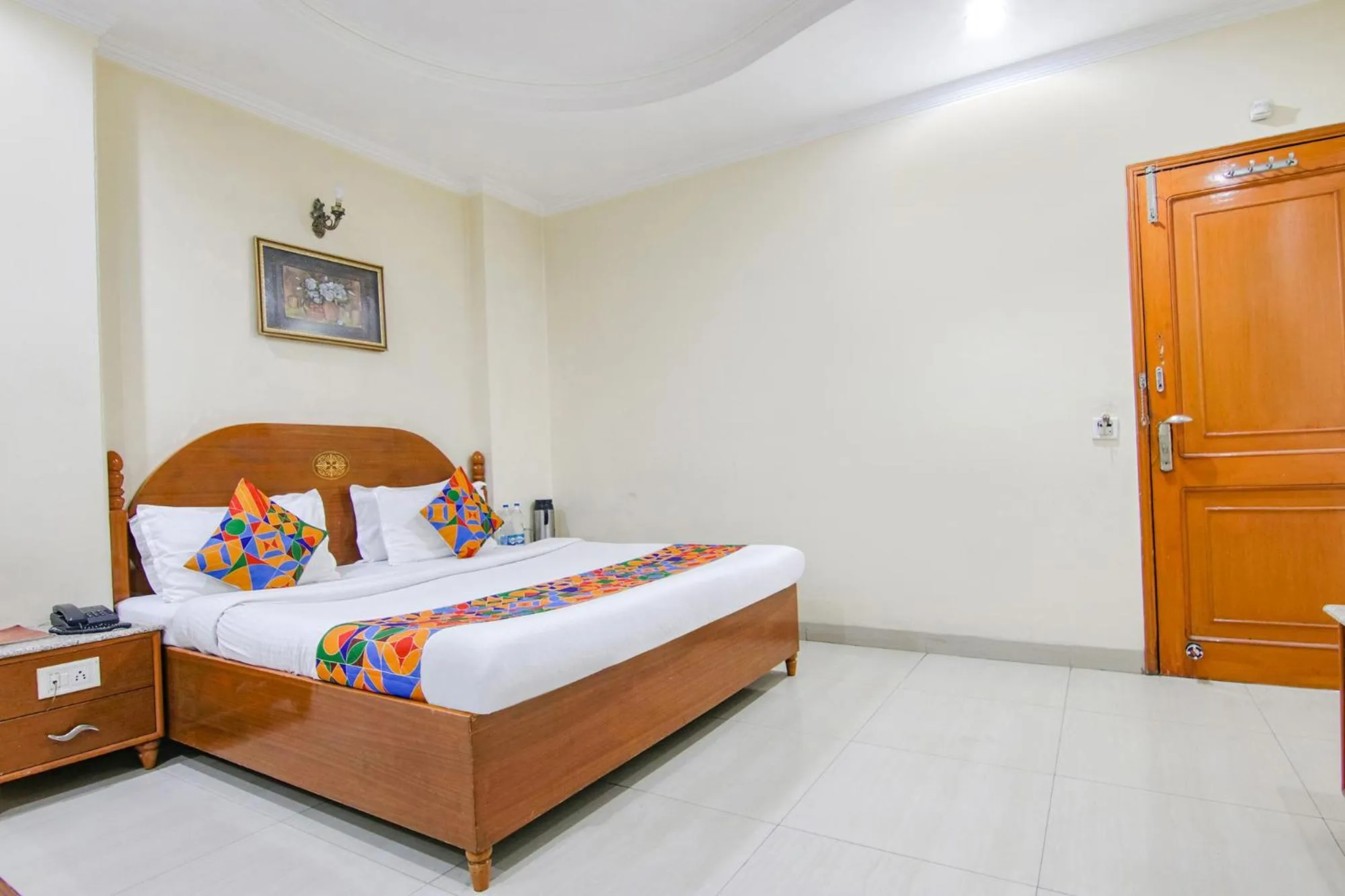 Bed in FabHotel CS Jalandhar