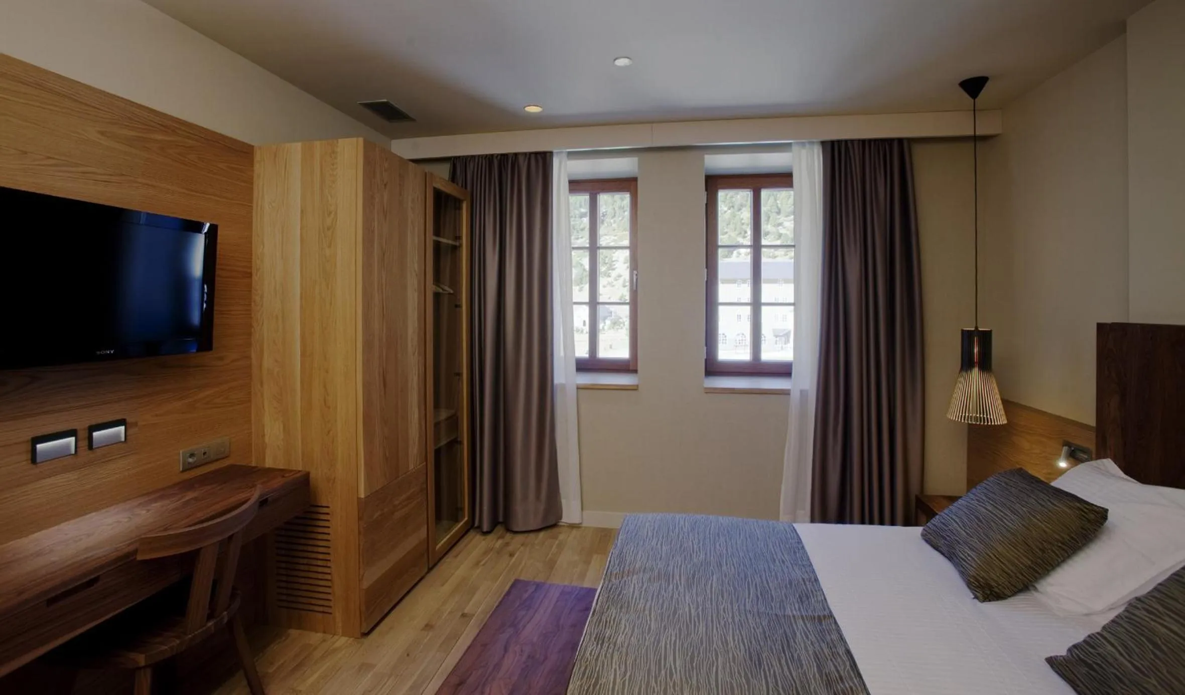 Property building, Bed in Hotel Vall de Núria