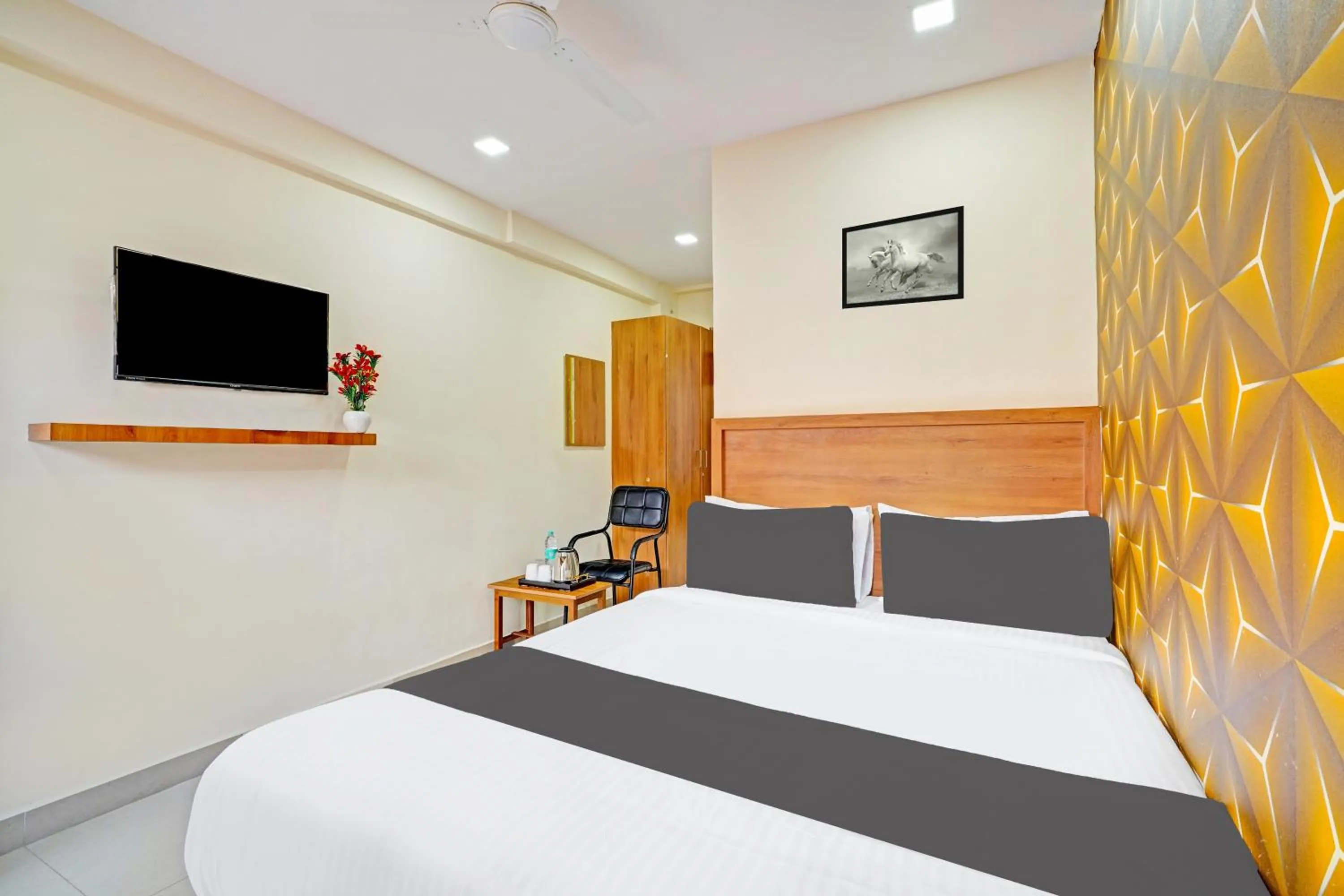 Bedroom in Hotel O Chalukya Comfort