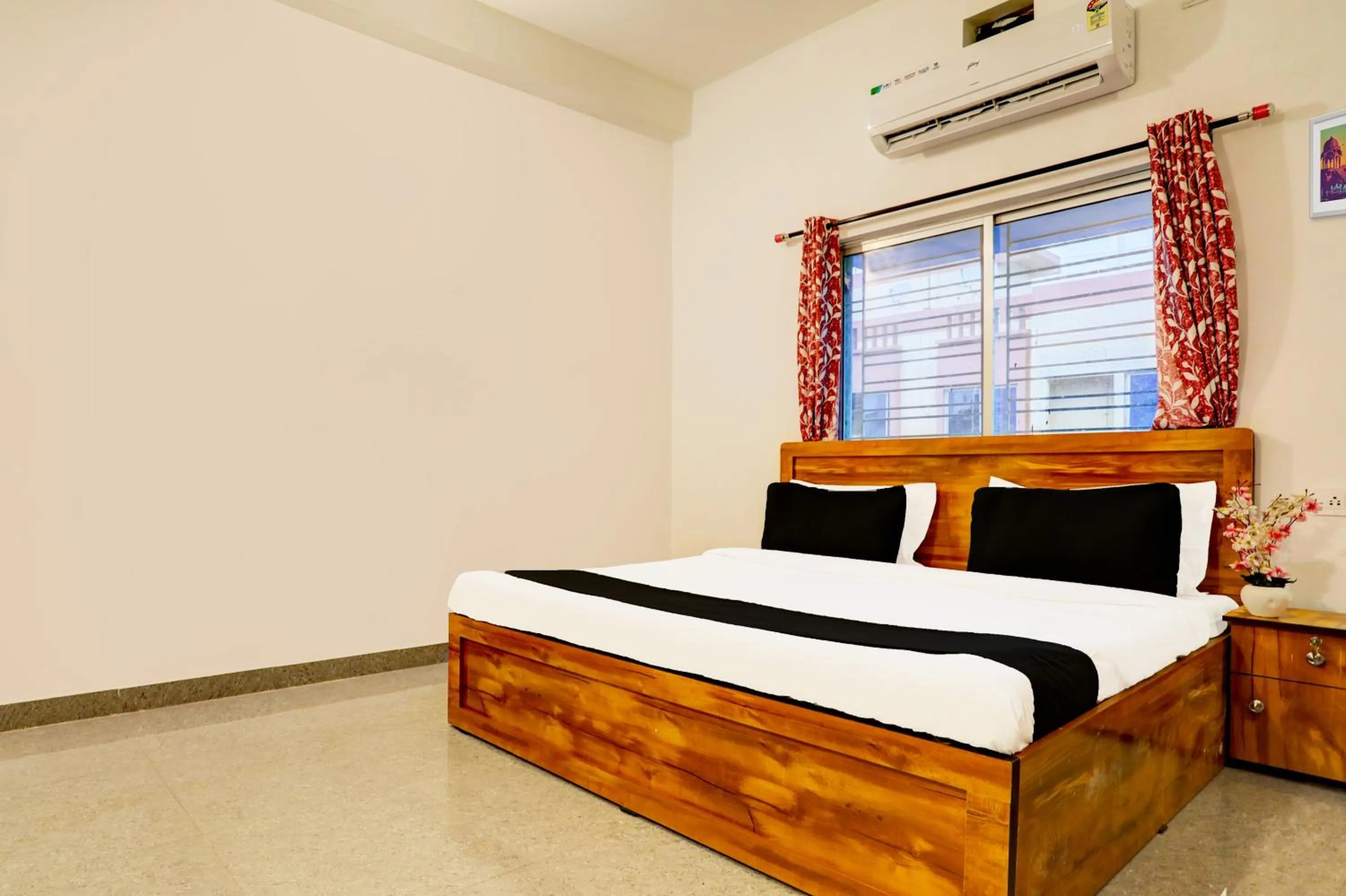 Bedroom in Hotel O Ayendri Premium Guest House