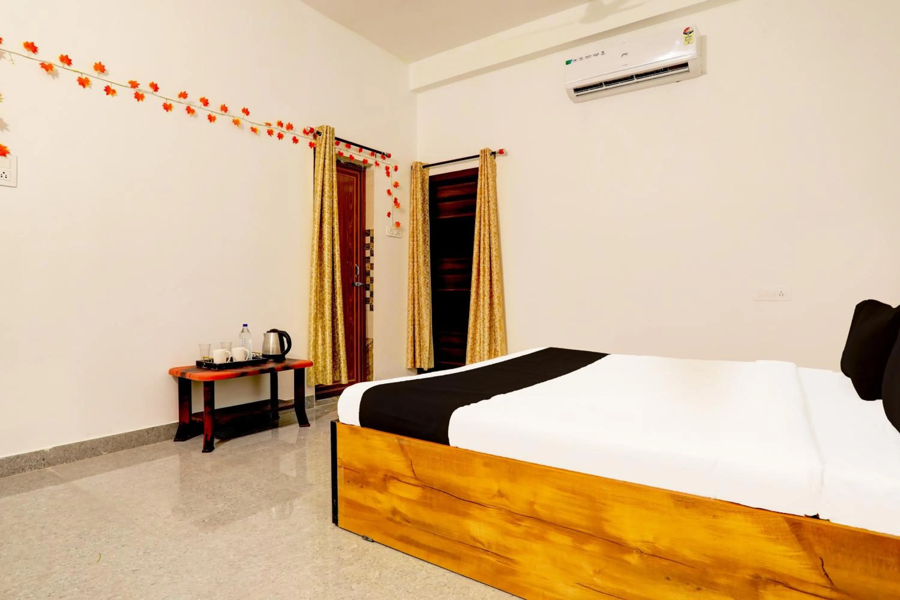 Bedroom in Hotel O Ayendri Premium Guest House