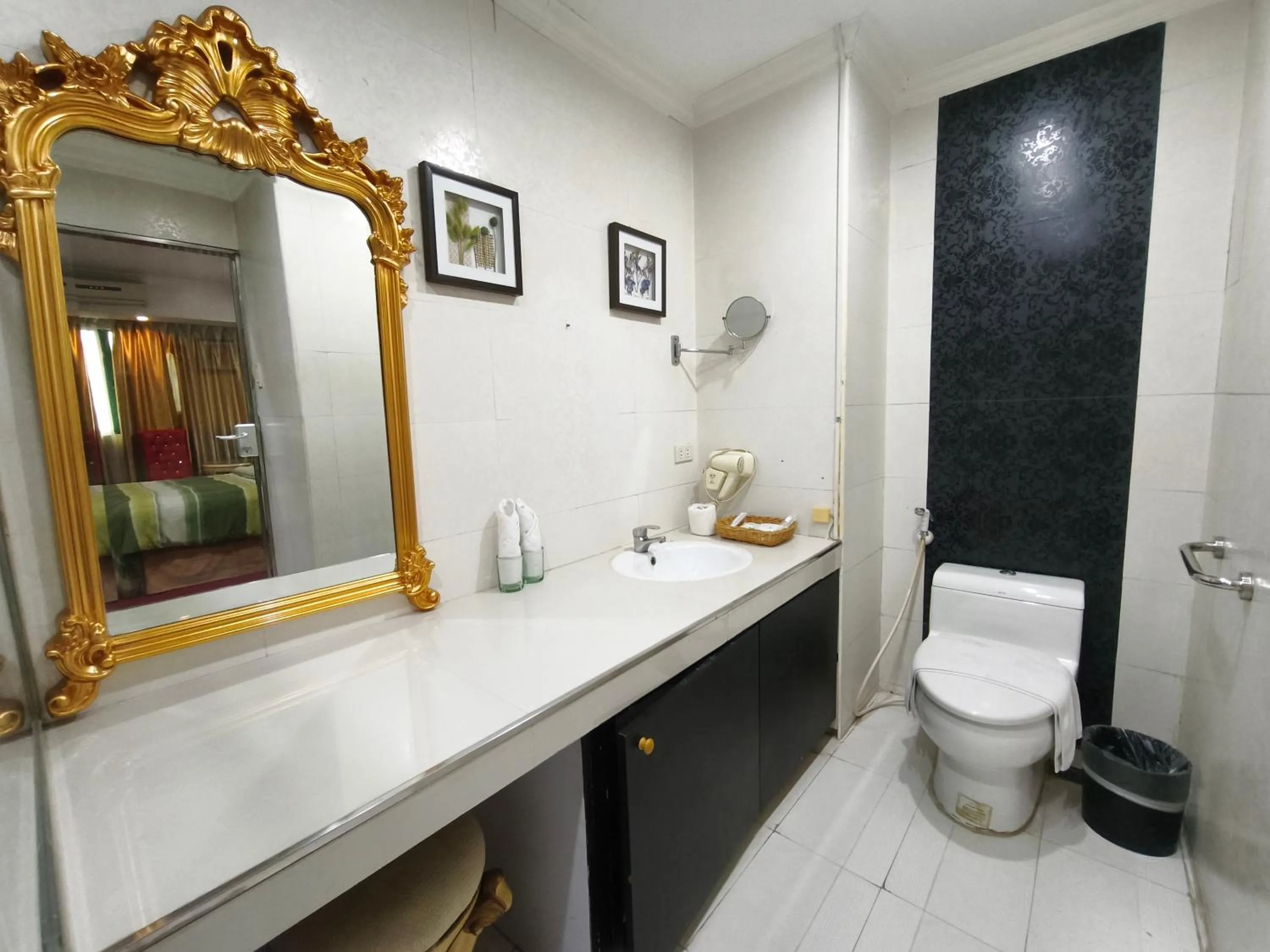 Bathroom in Lido De Paris Hotel