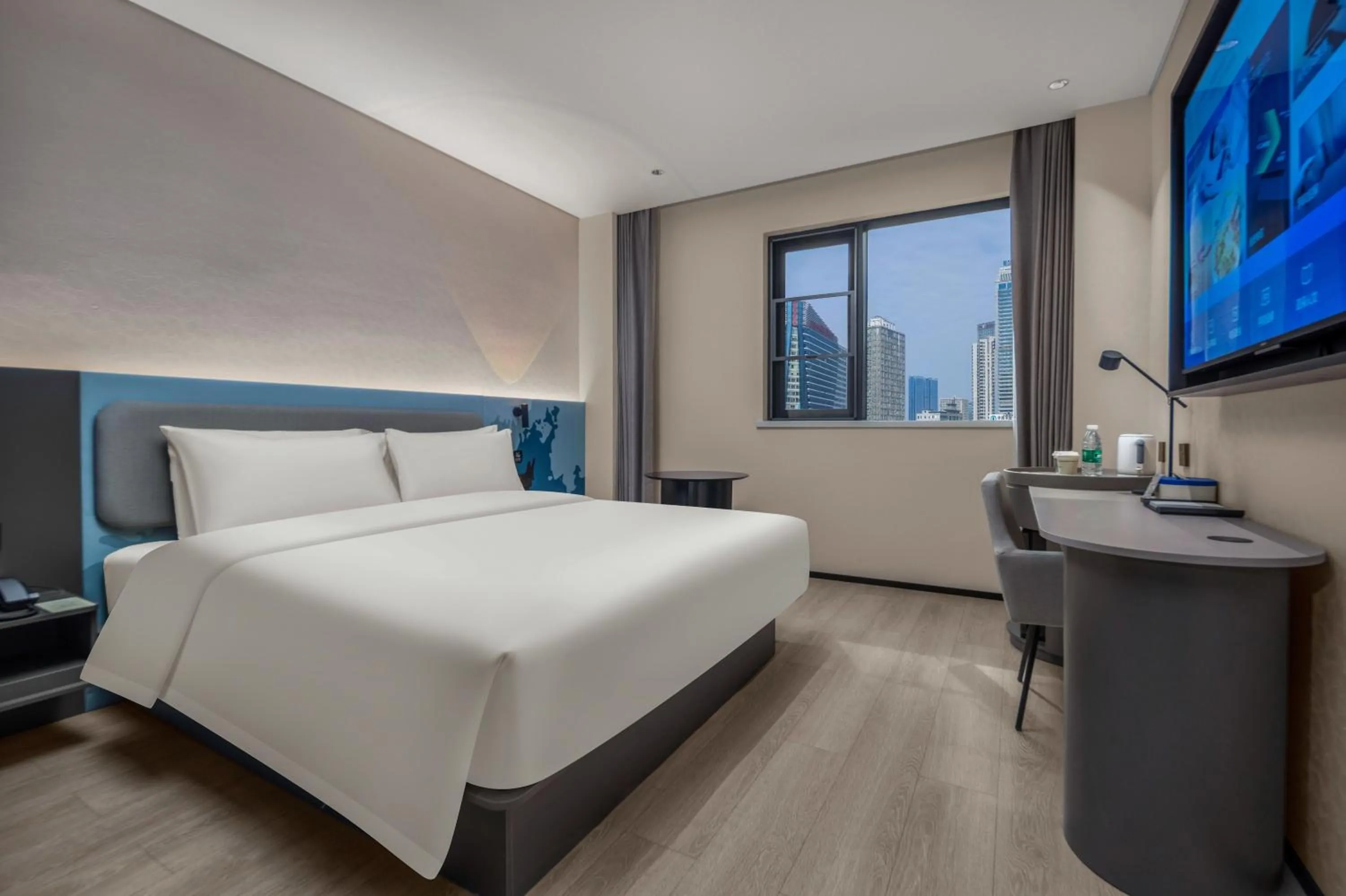 Bed in Changsha International Financial Center Furong Square Subway Station Qingju Hotel