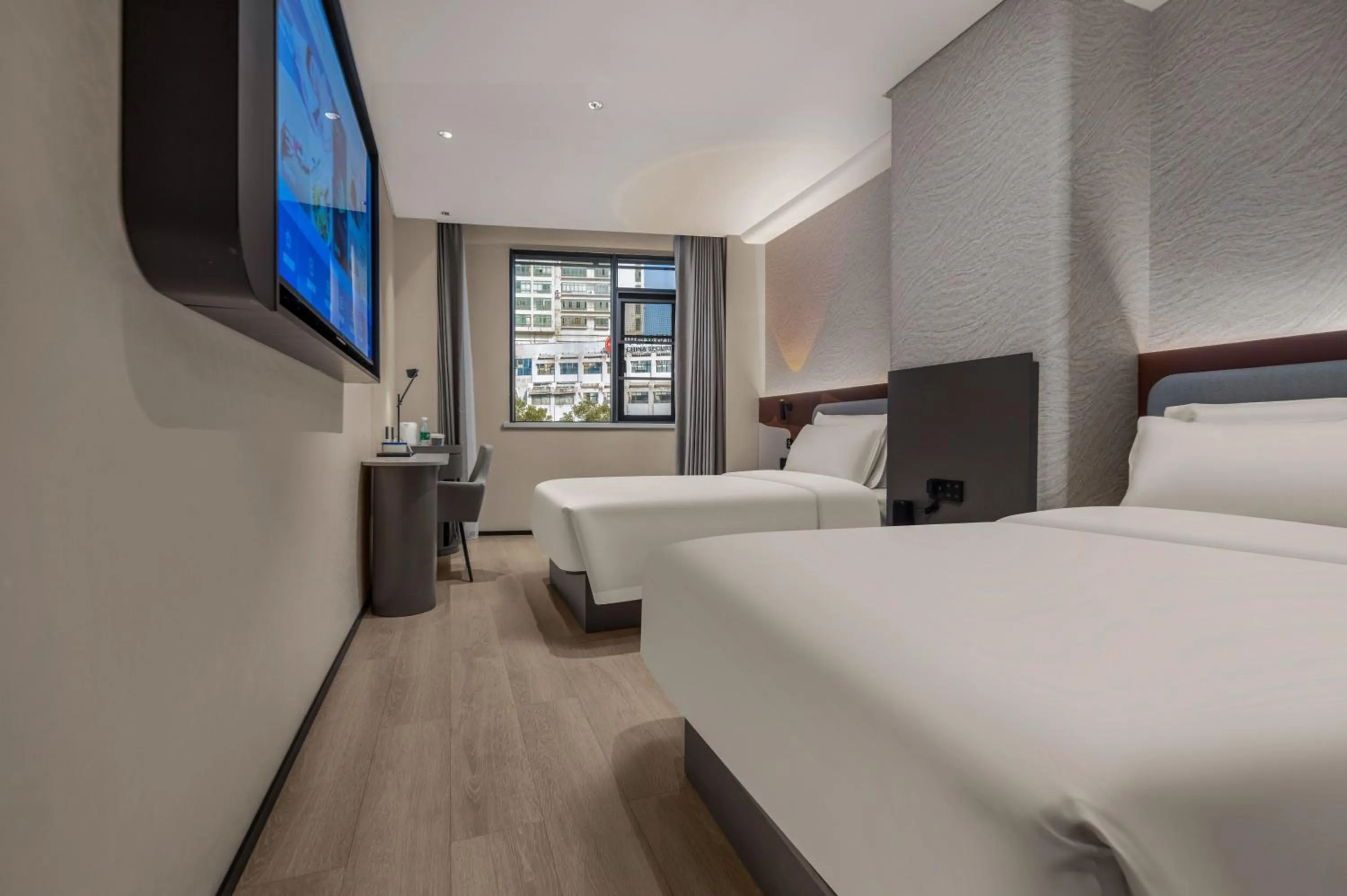 Bed in Changsha International Financial Center Furong Square Subway Station Qingju Hotel