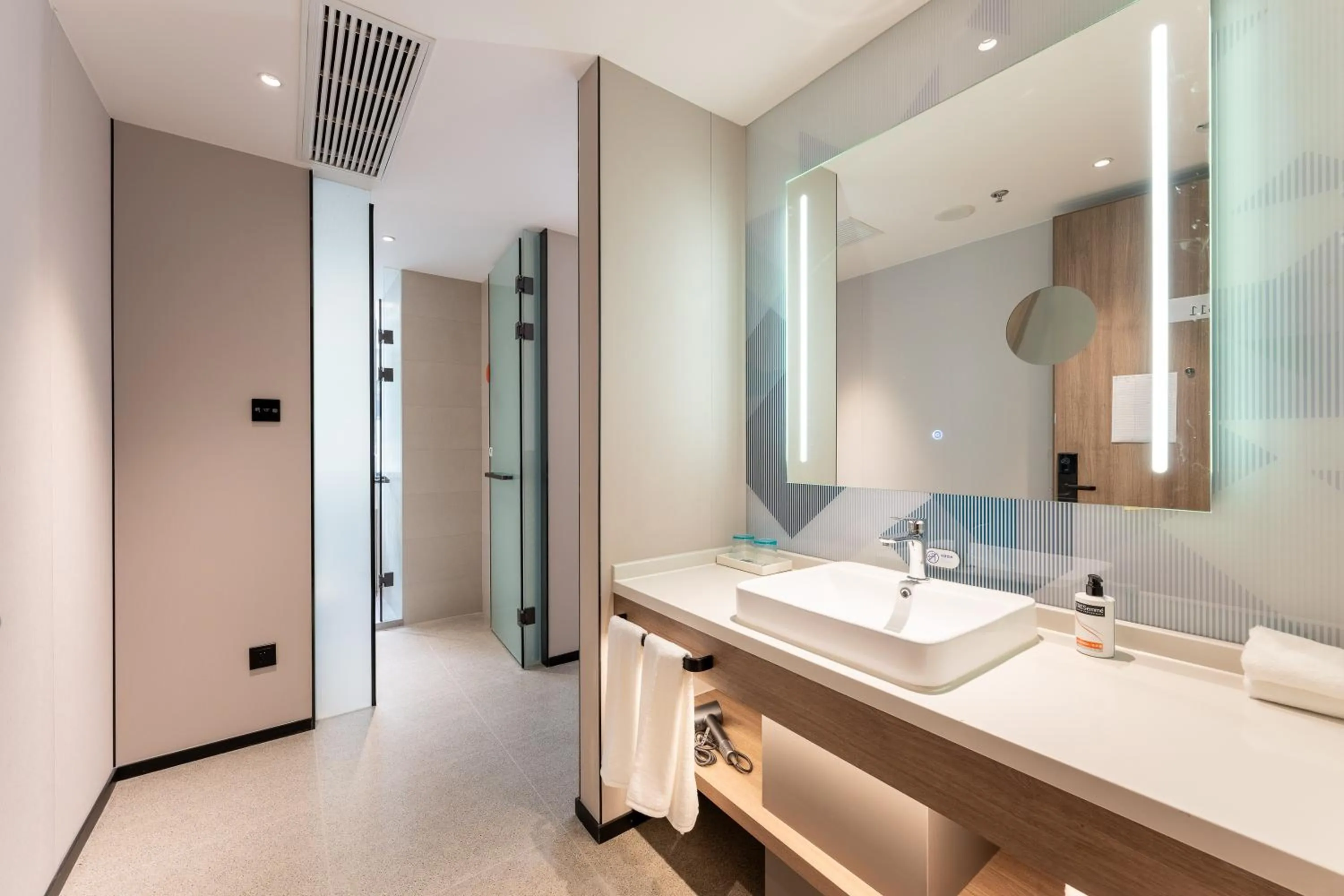 Bathroom in Holiday Inn Express Shanghai Jing'an Temple by IHG