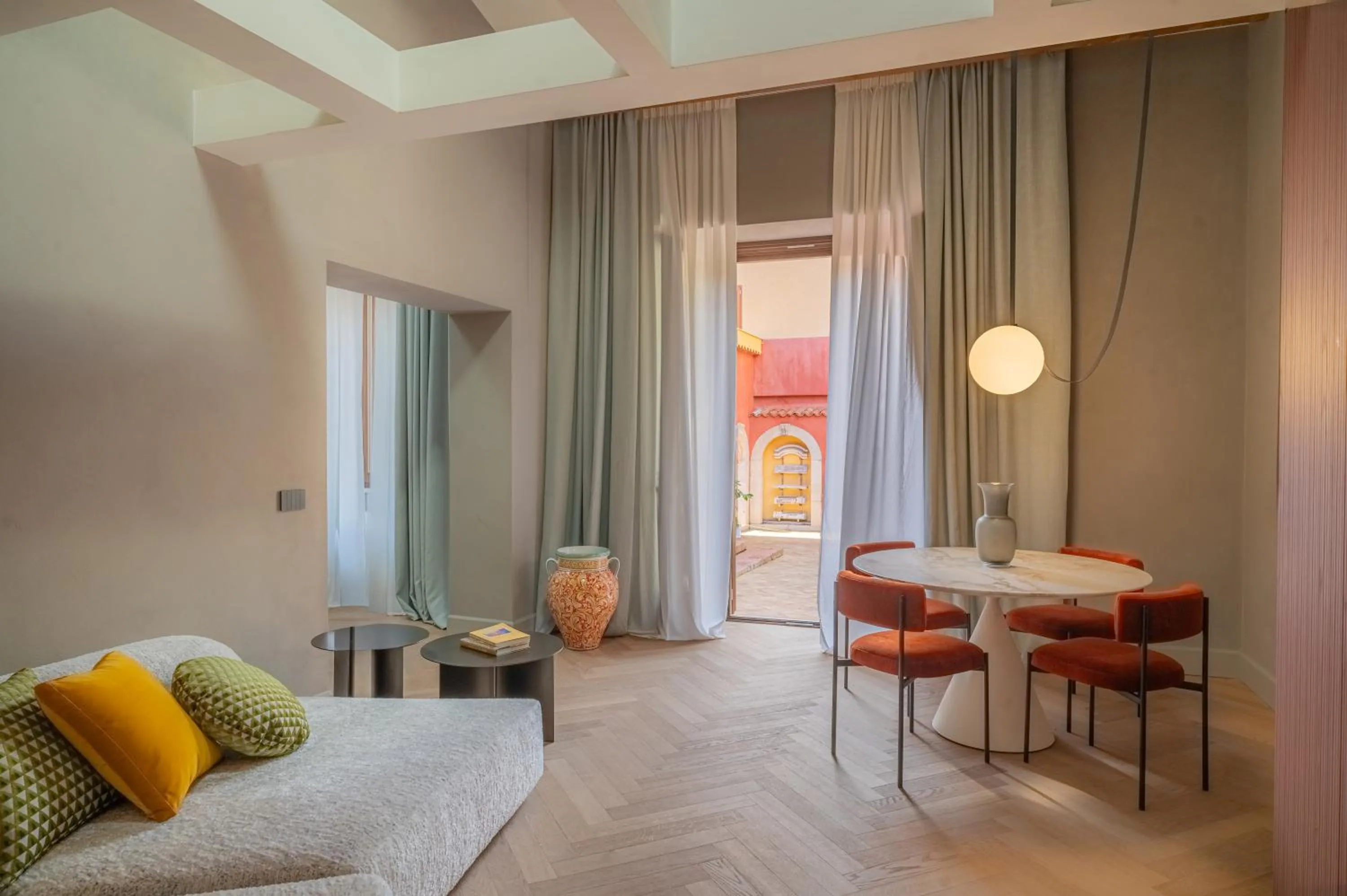 Seating area, Bed in Villa Conrad