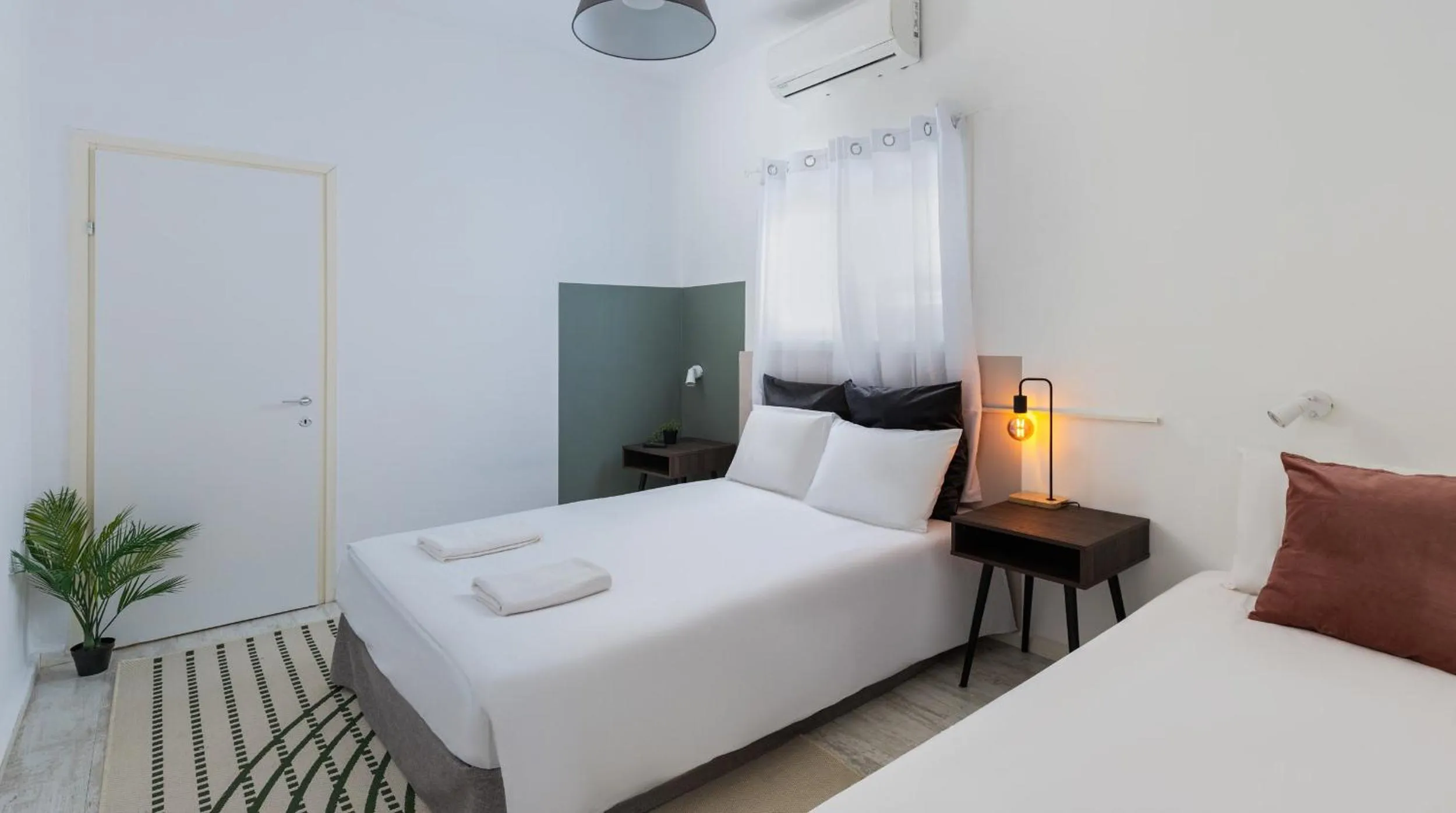 Bed in Authentic 2 bedrooms apt near the beach