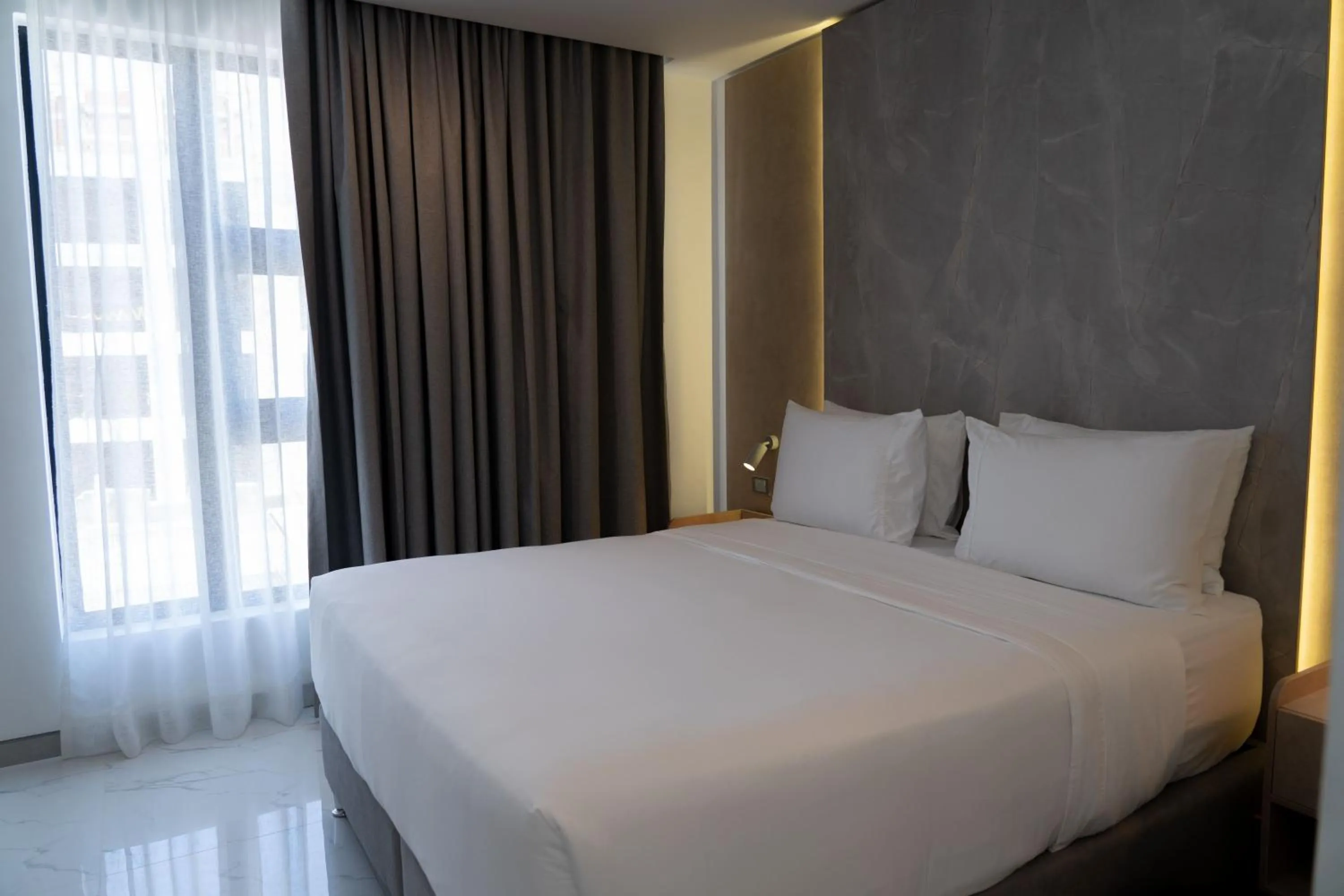 Bed in Delamar Hotel