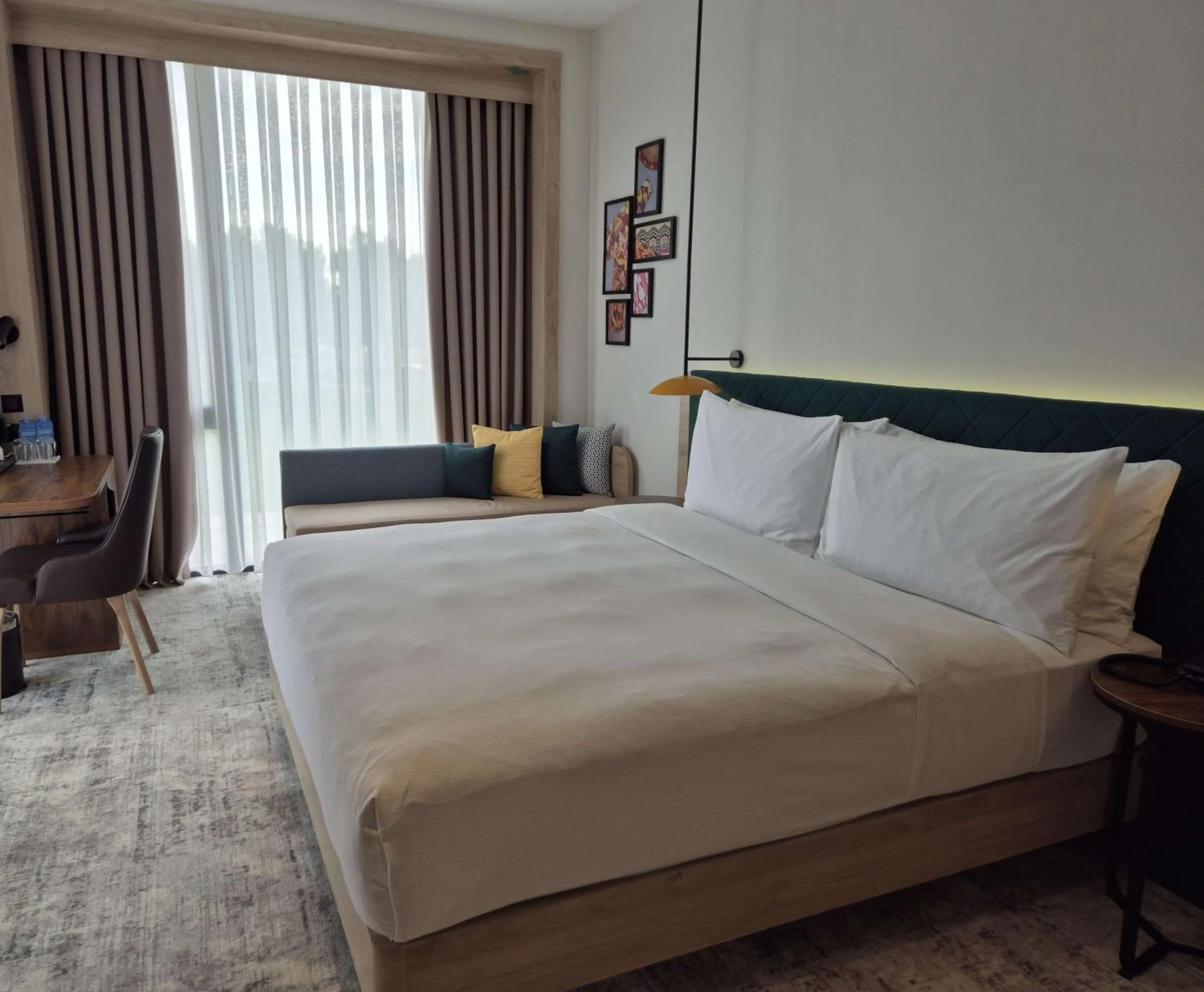 Living room, Bed in Hilton Garden Inn Termez Airitom