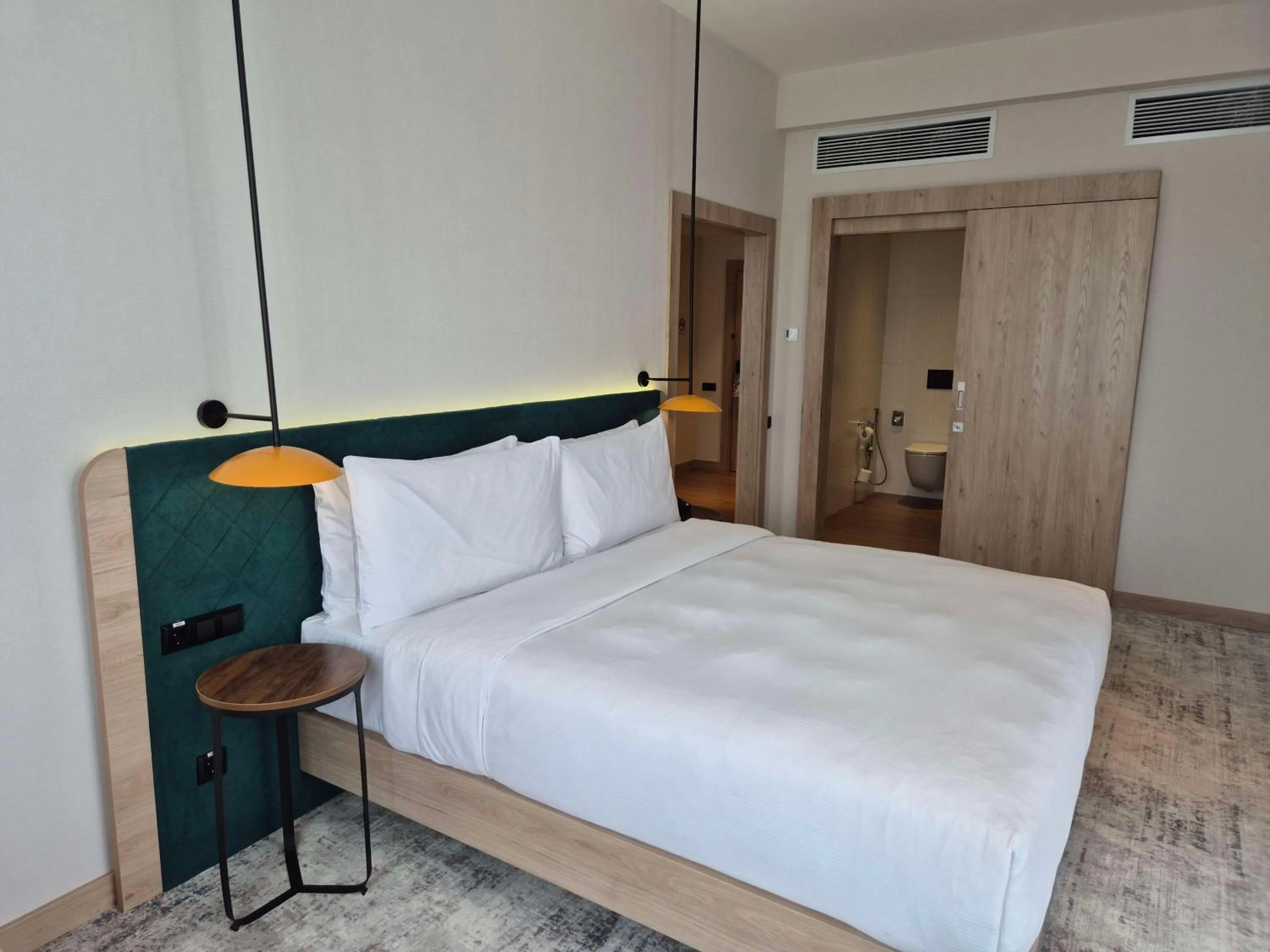 Bed in Hilton Garden Inn Termez Airitom