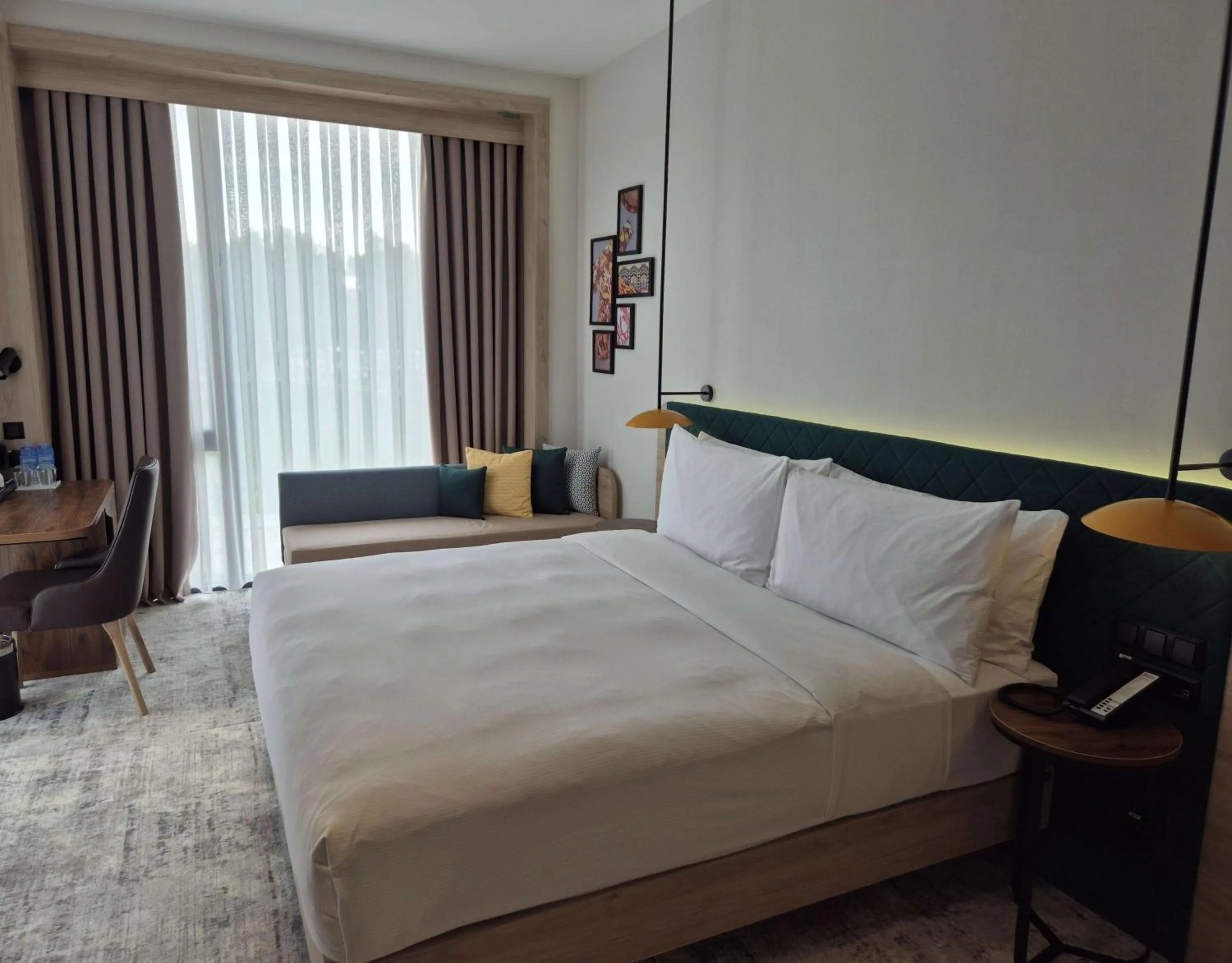 Living room, Bed in Hilton Garden Inn Termez Airitom