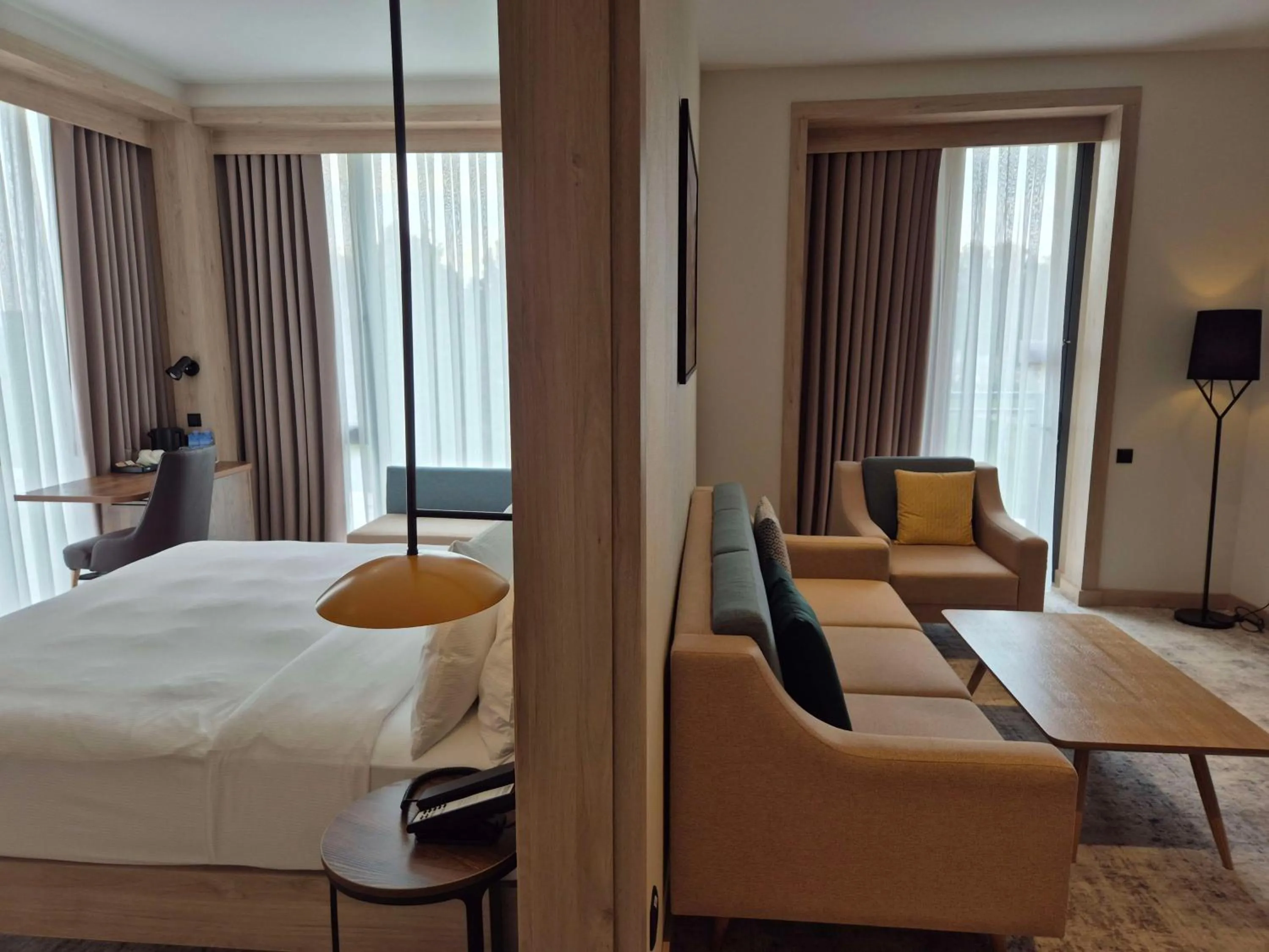 Living room, Bed in Hilton Garden Inn Termez Airitom