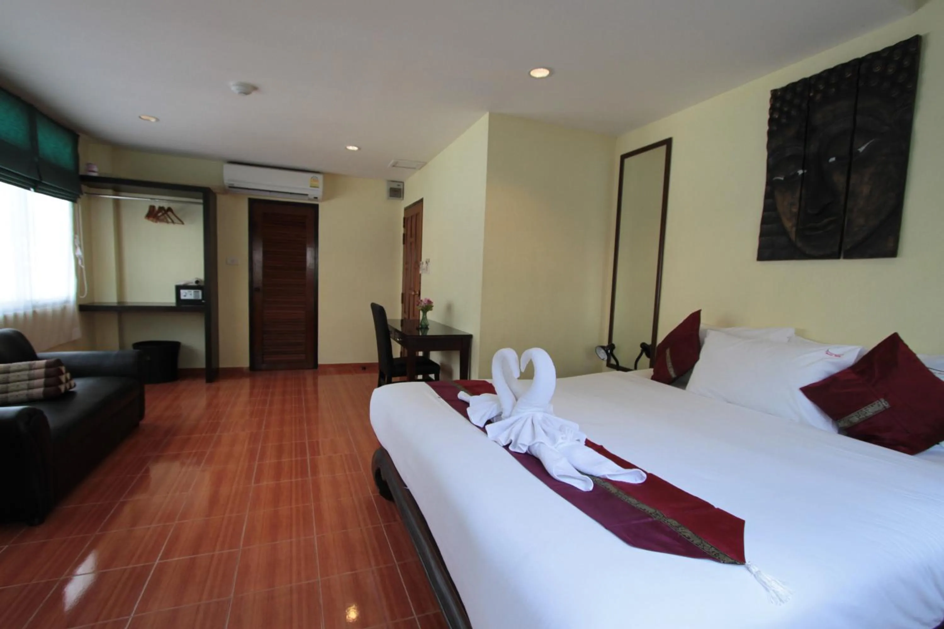 Bed in Karon Pool Hotel