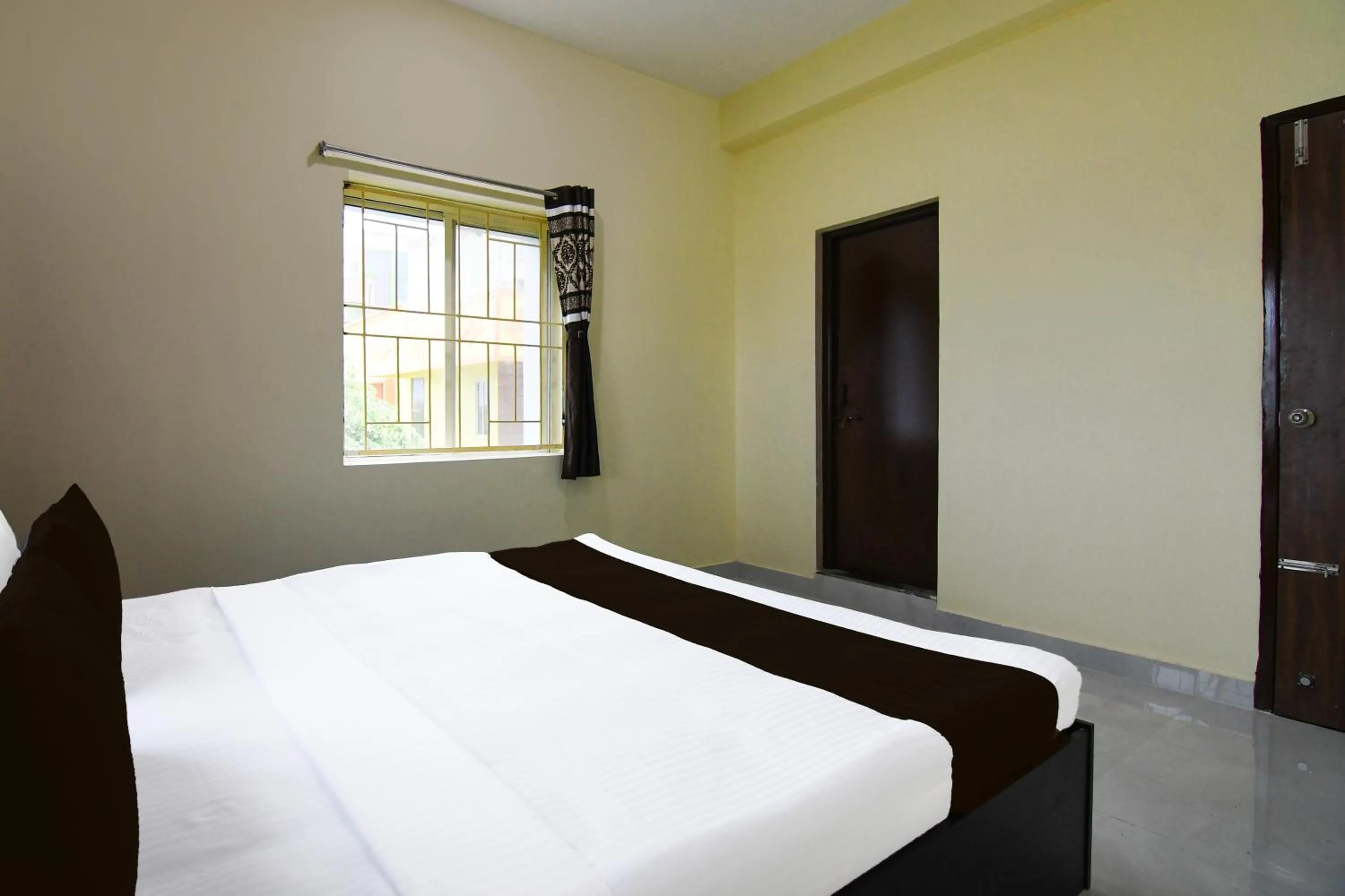 Bedroom, Bed in Super Hotel O MNJ Mansion