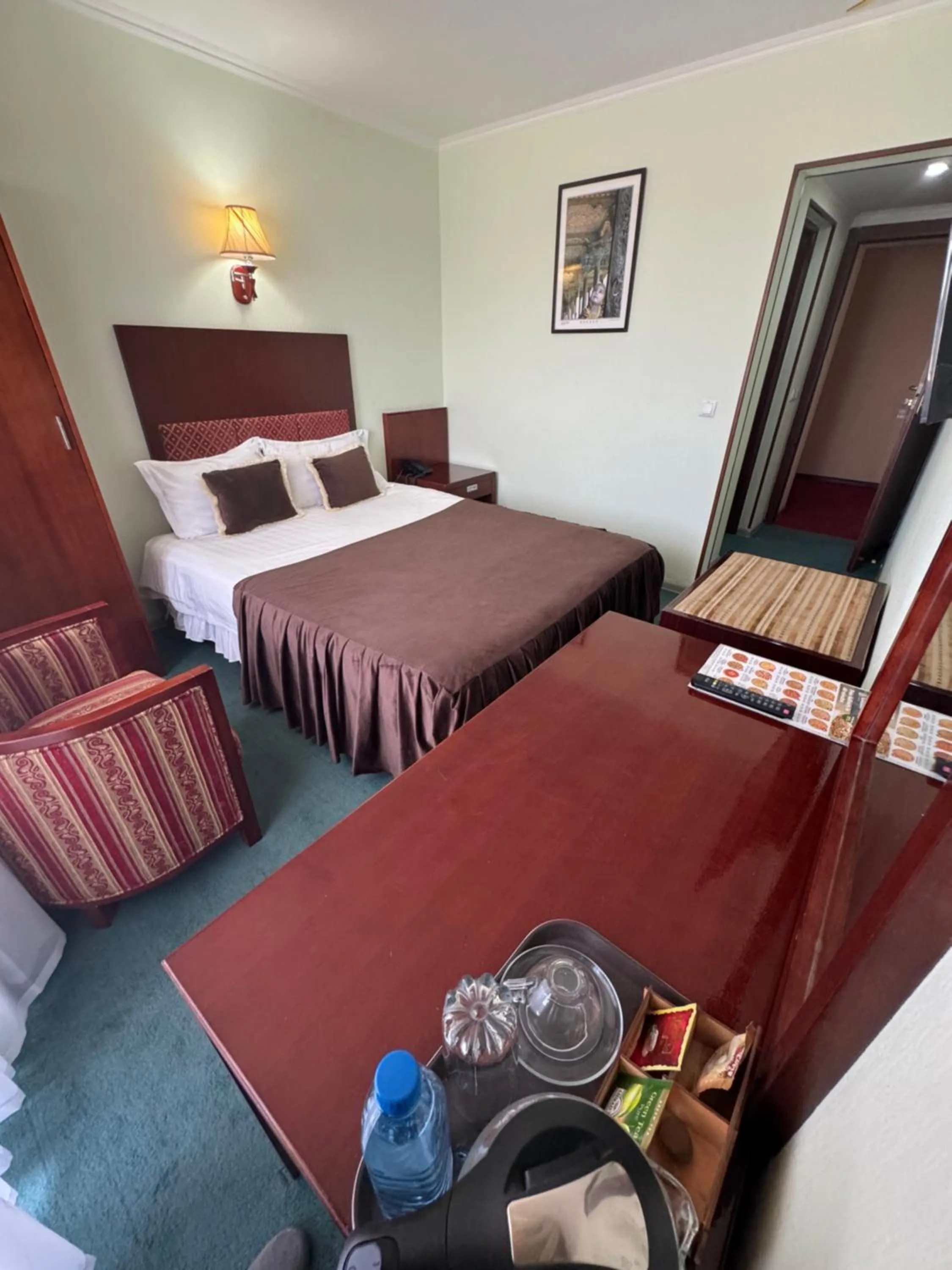 Bed in Hotel Grand Bukhara