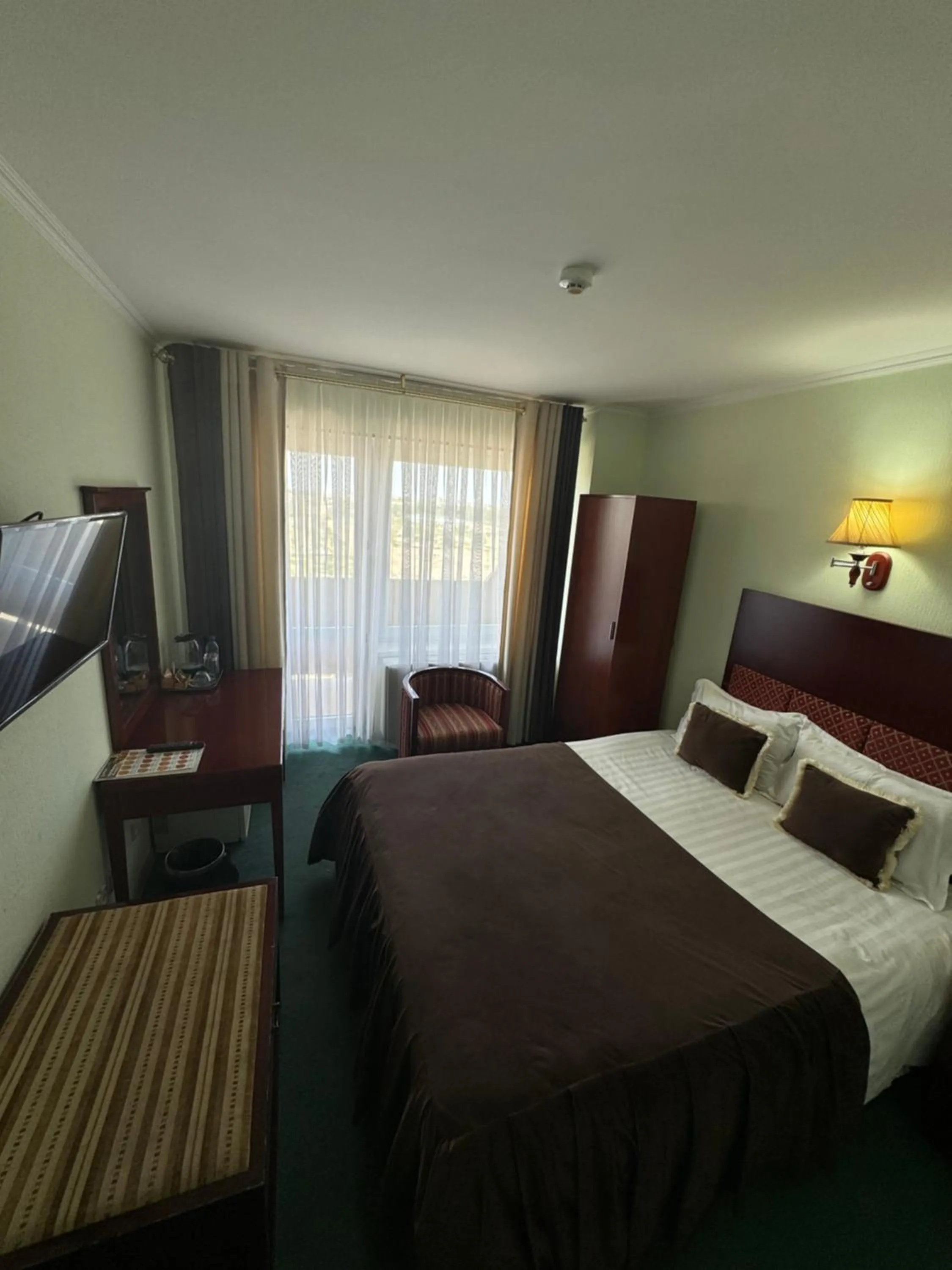 Bed in Hotel Grand Bukhara