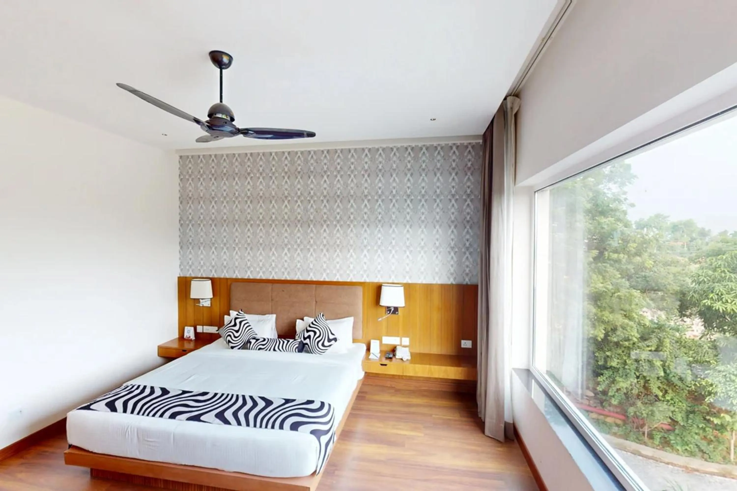 Bed in Sunday Resort & Spa by CheckIn Manesar Gurugram