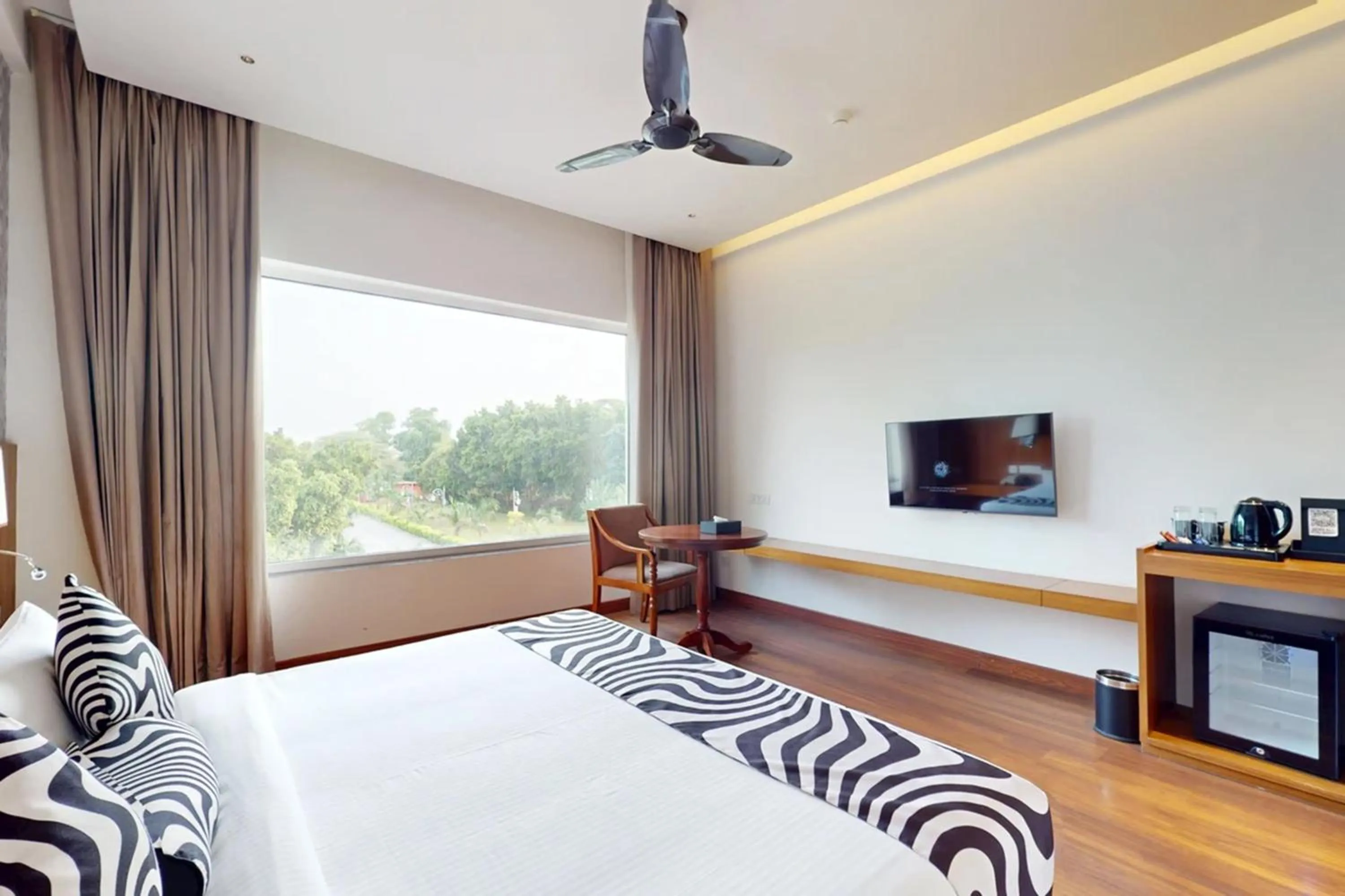 Bed in Sunday Resort & Spa by CheckIn Manesar Gurugram