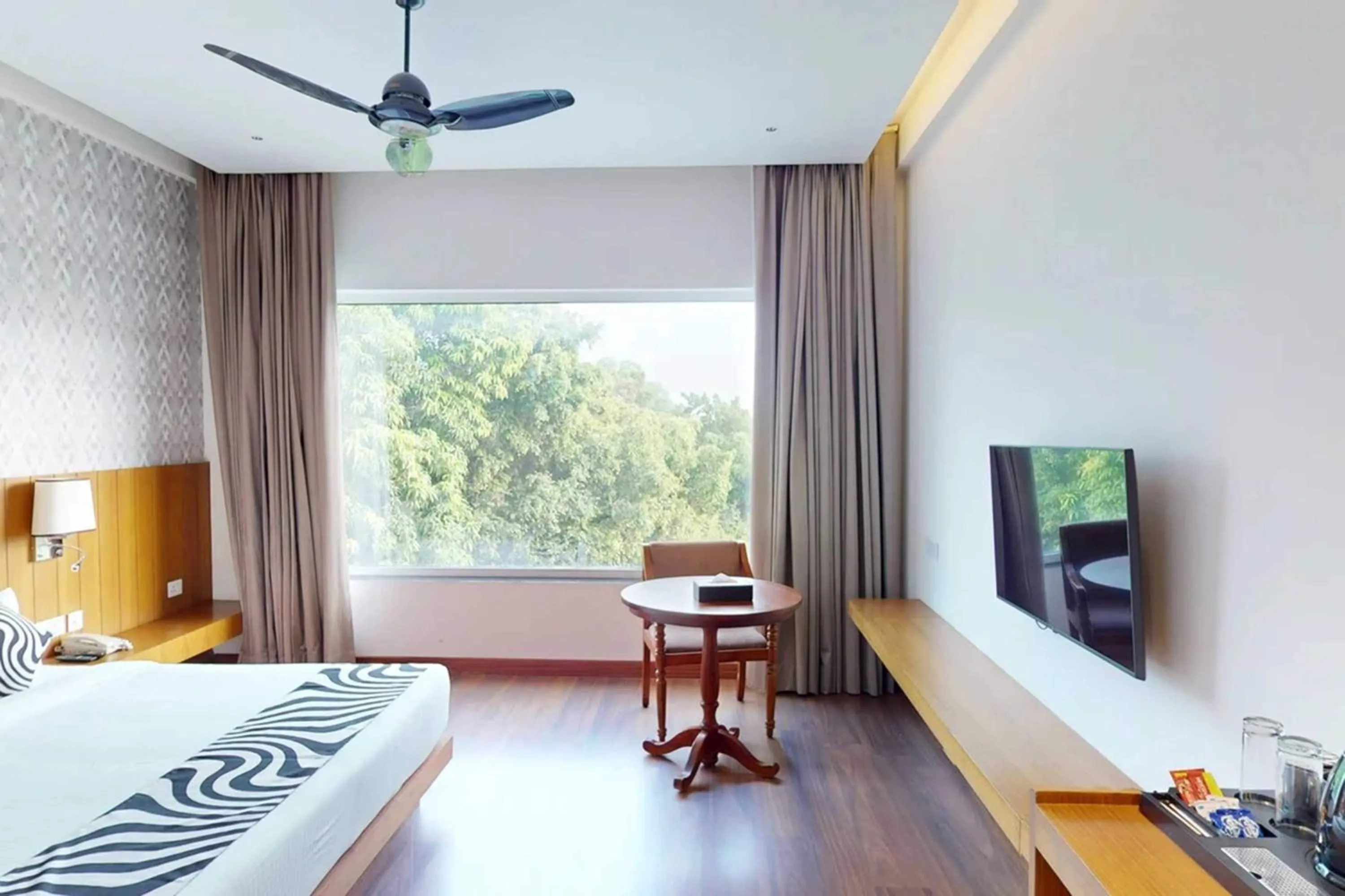 Bedroom, Bed in Sunday Resort & Spa by CheckIn Manesar Gurugram