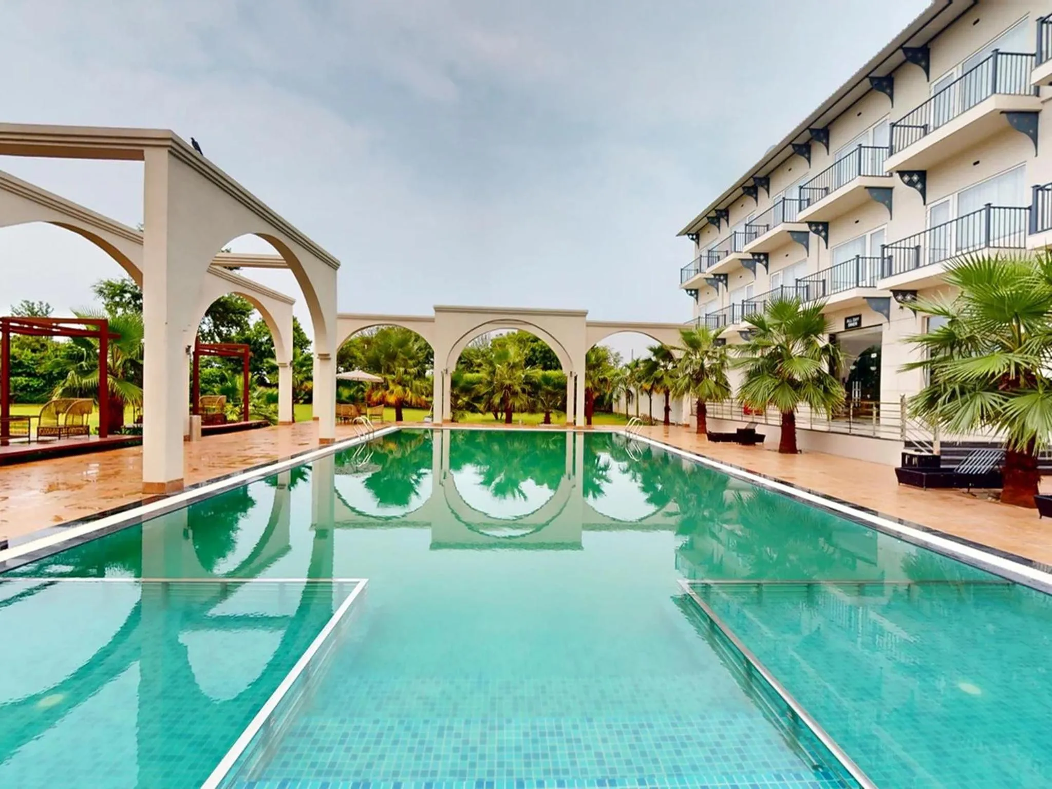 Pool view in Sunday Resort & Spa by CheckIn Manesar Gurugram