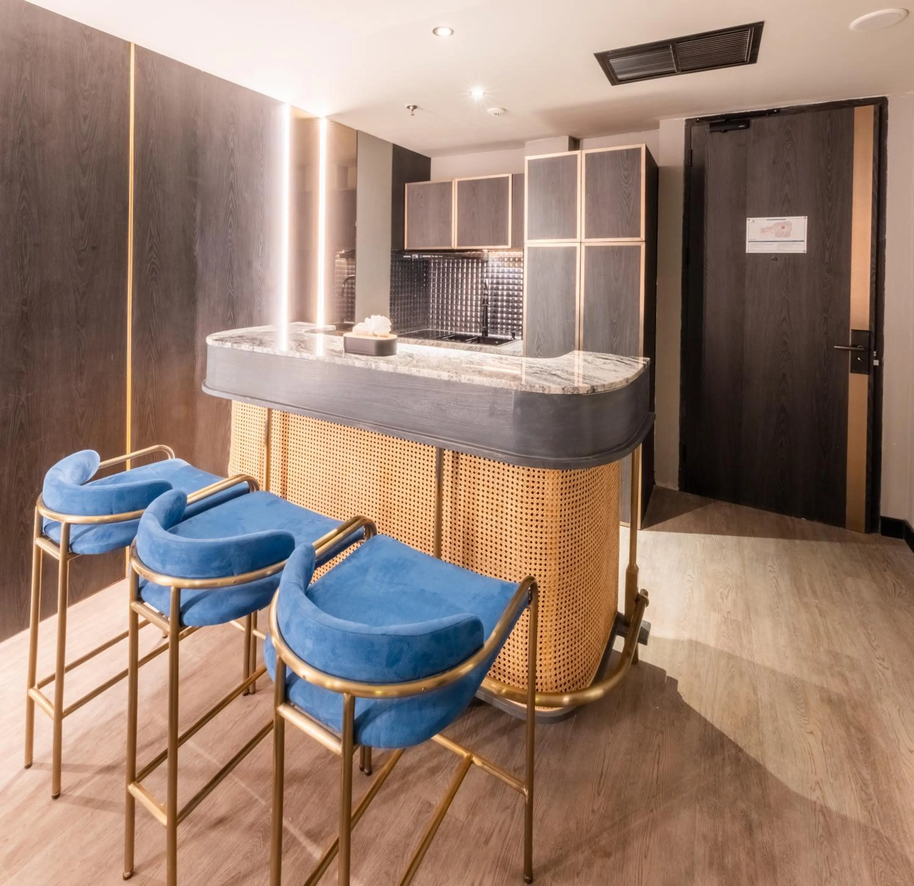 Kitchen or kitchenette in The All - Suite Pentacity Hotel Balikpapan