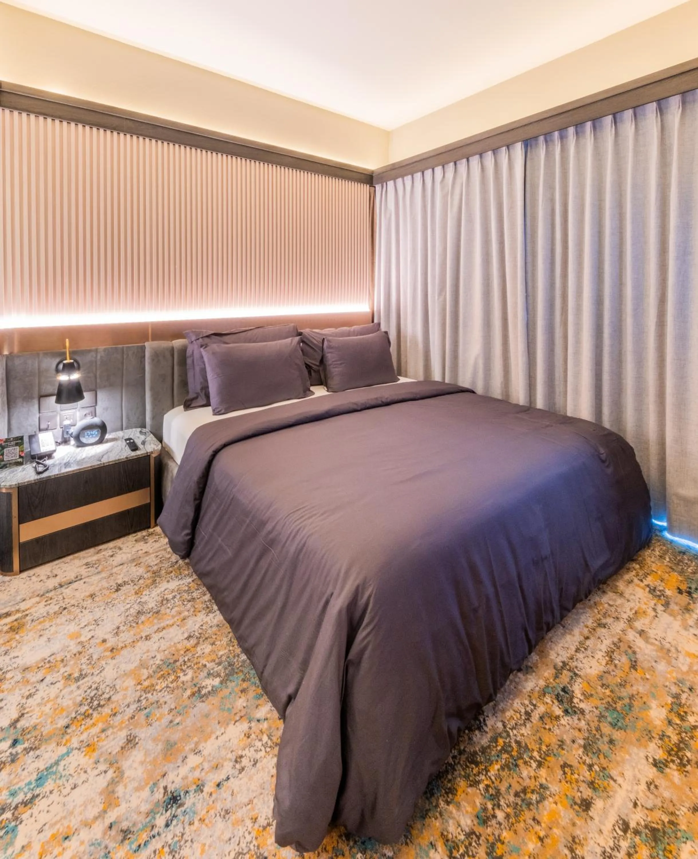 Bedroom, Bed in The All - Suite Pentacity Hotel Balikpapan
