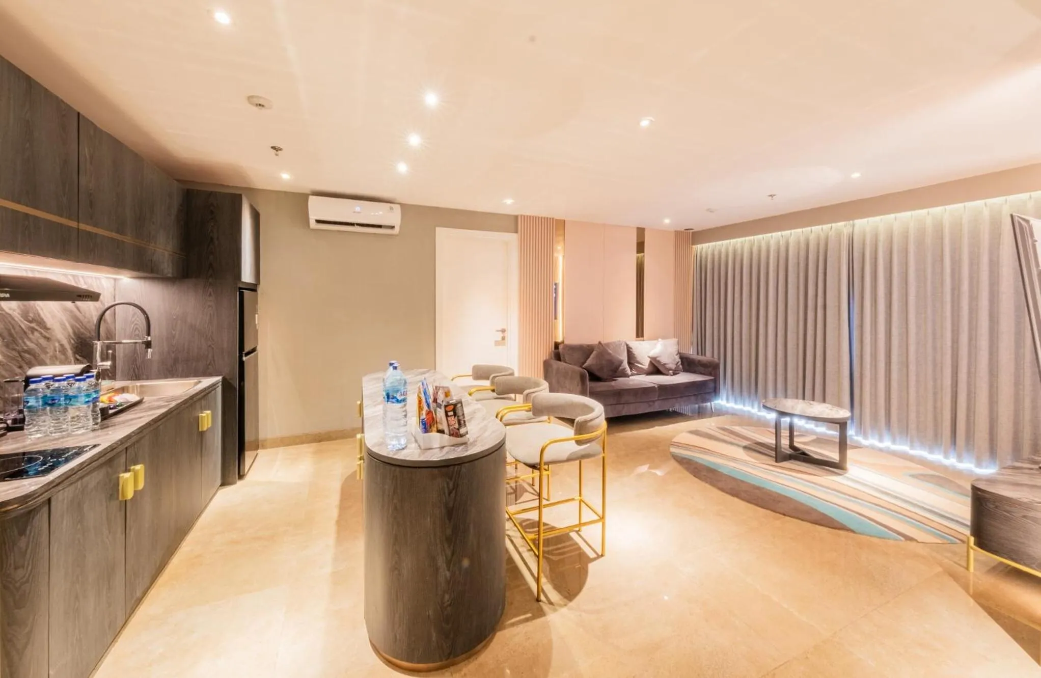 Kitchen or kitchenette in The All - Suite Pentacity Hotel Balikpapan