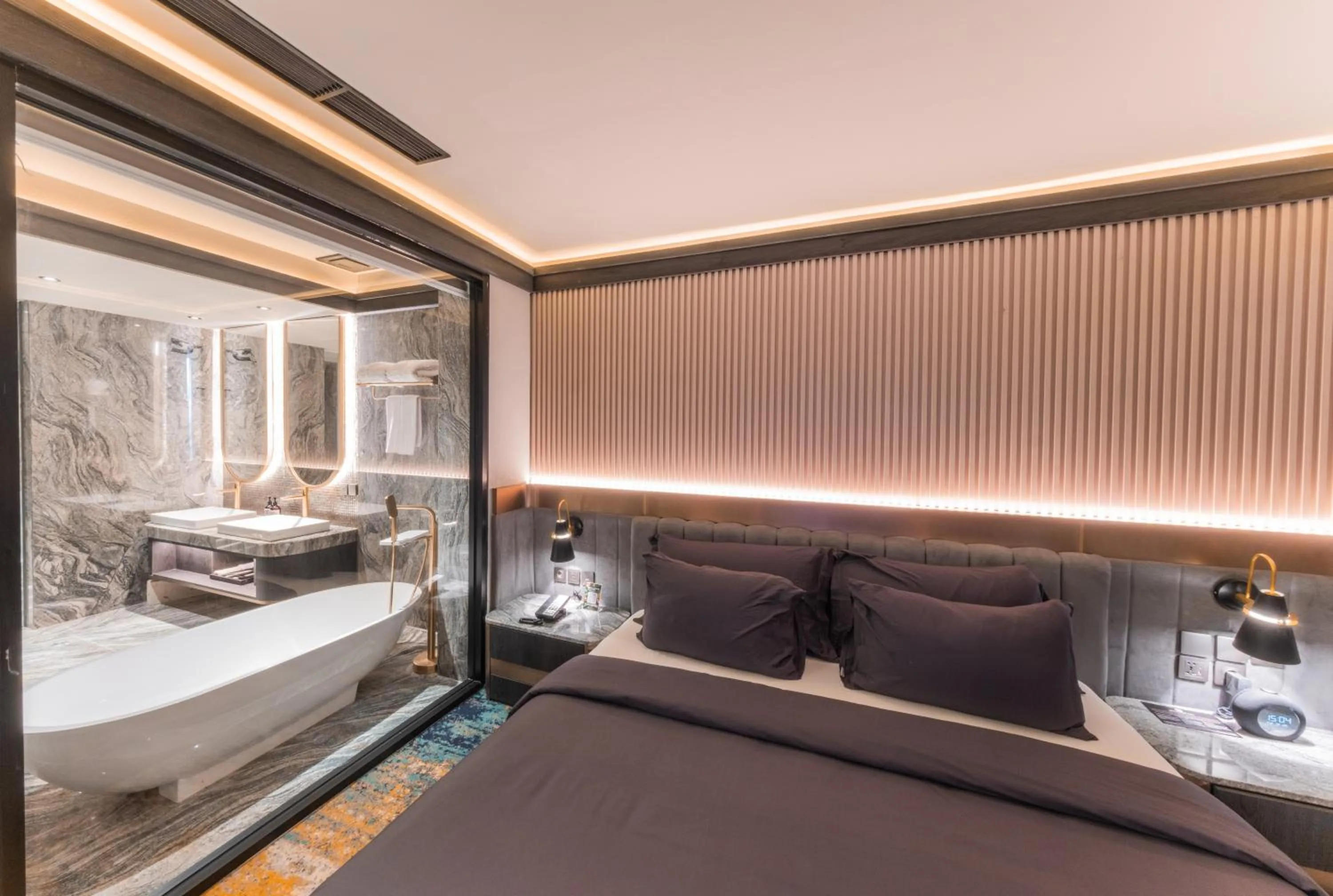 Bed in The All - Suite Pentacity Hotel Balikpapan