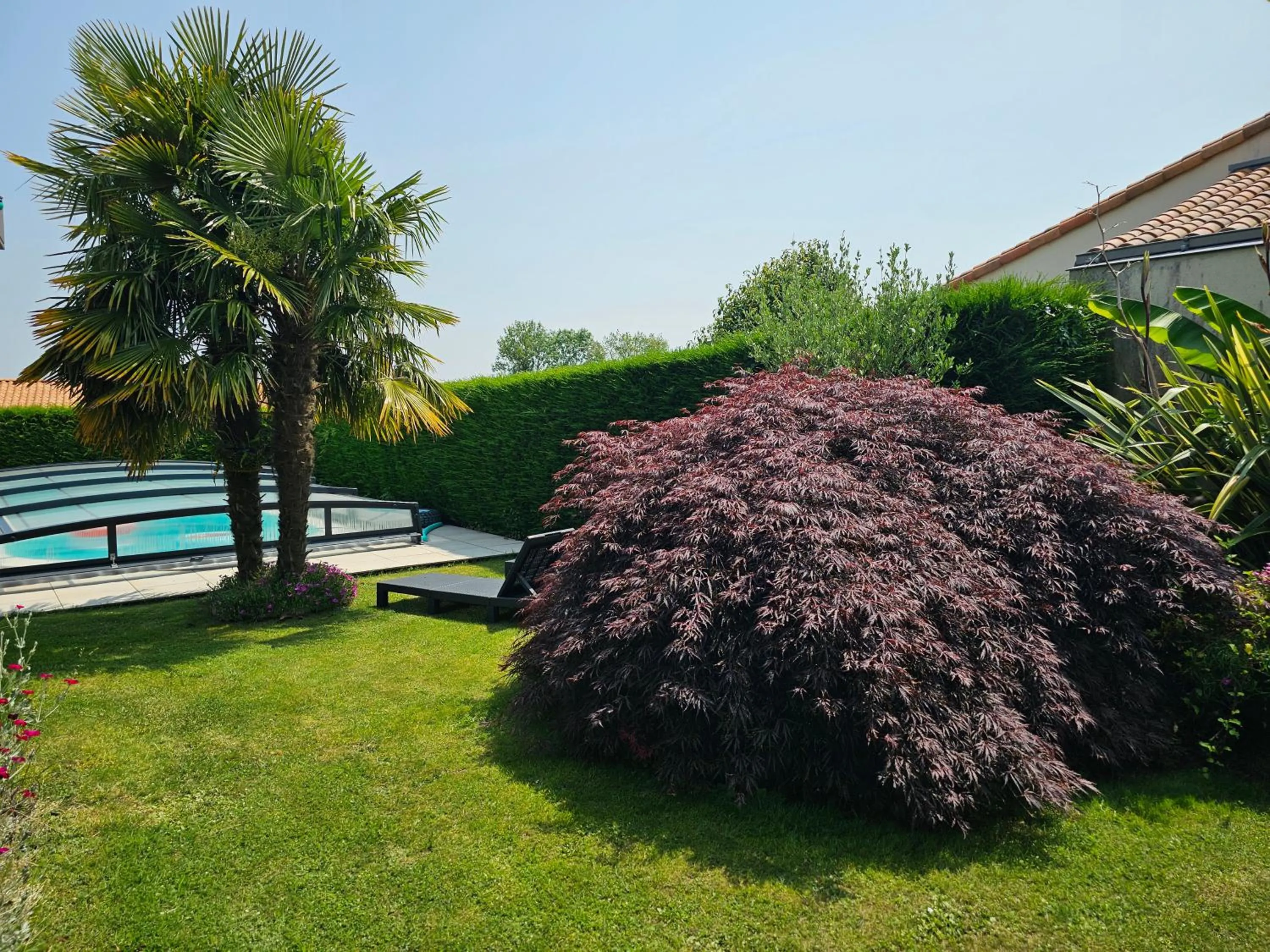 Garden in Le Pavachon gîte familial piscine couverte privée chauffée - Aux portes du Puy duFou