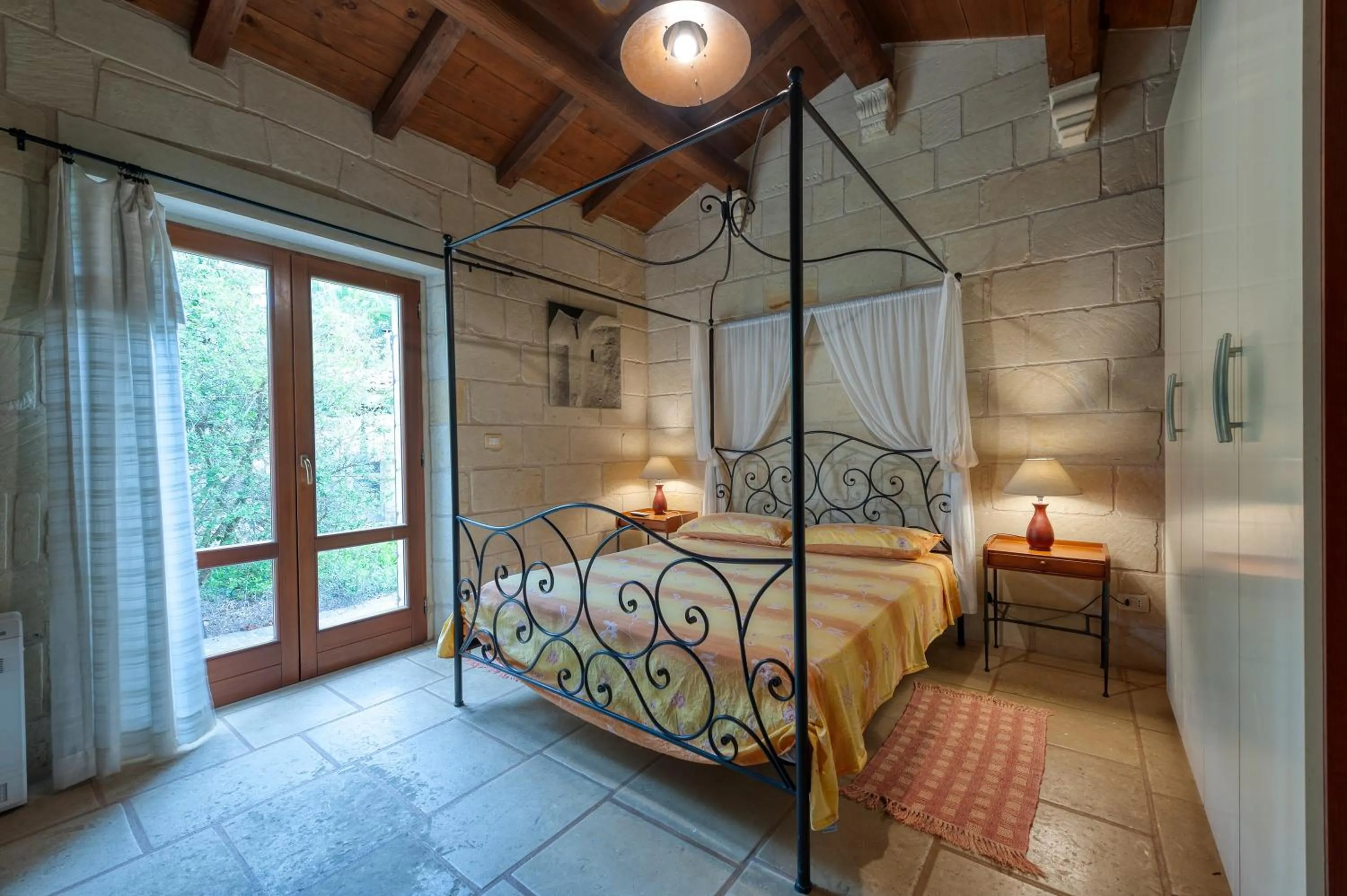 Living room, Bed in Masseria Copertini