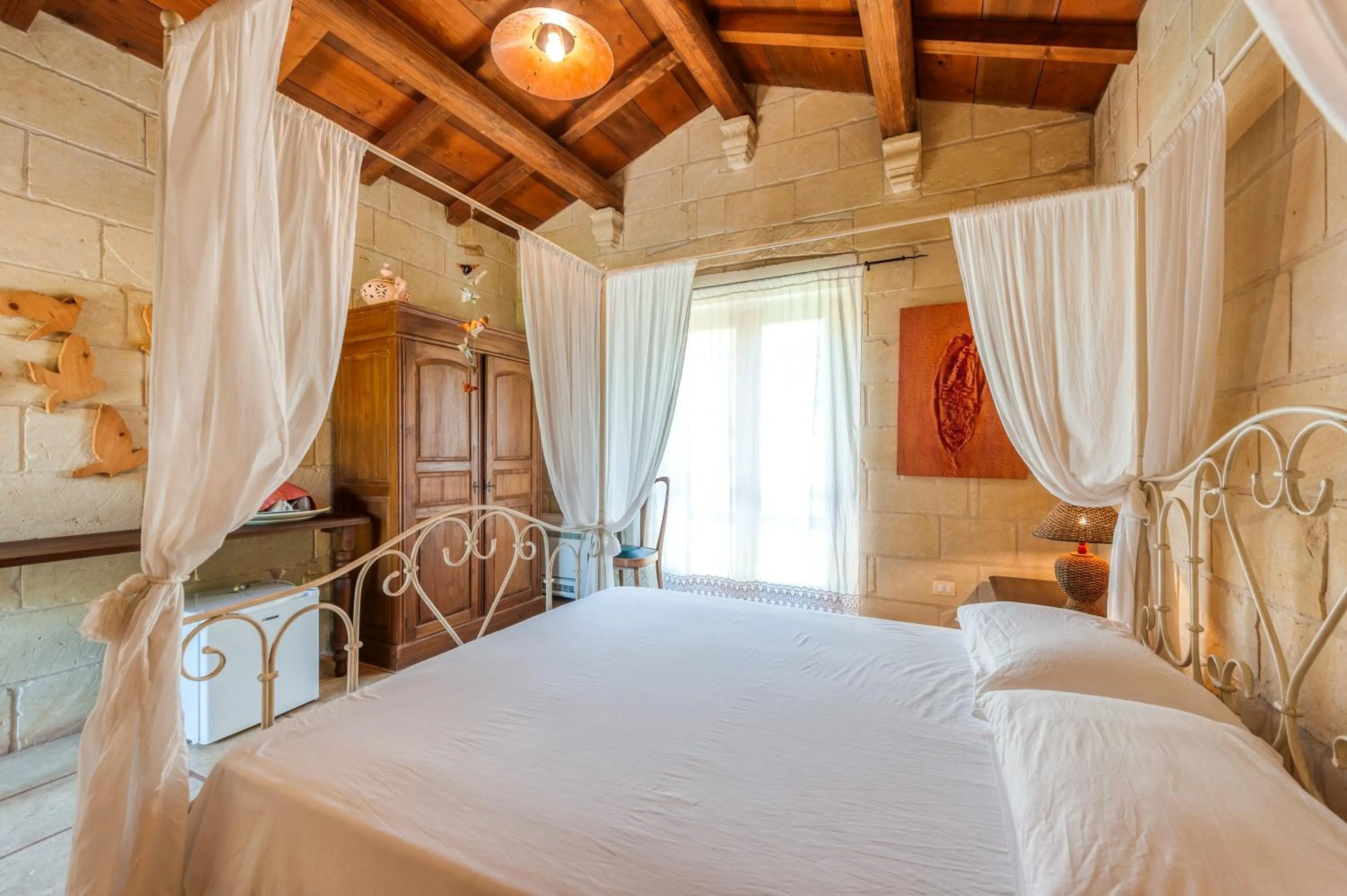 Living room, Bed in Masseria Copertini