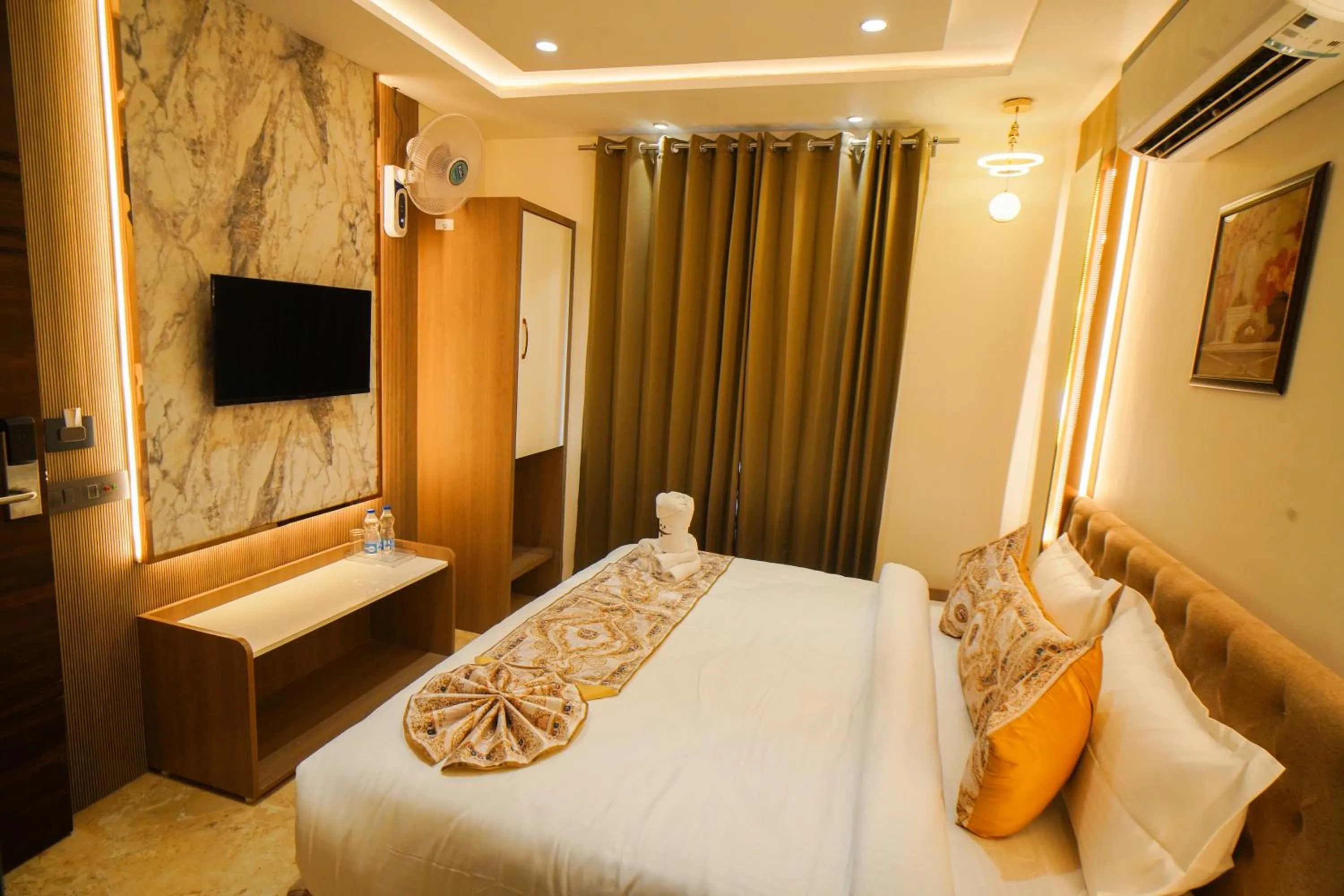 Bed in Hotel Ammison Inn & Suites