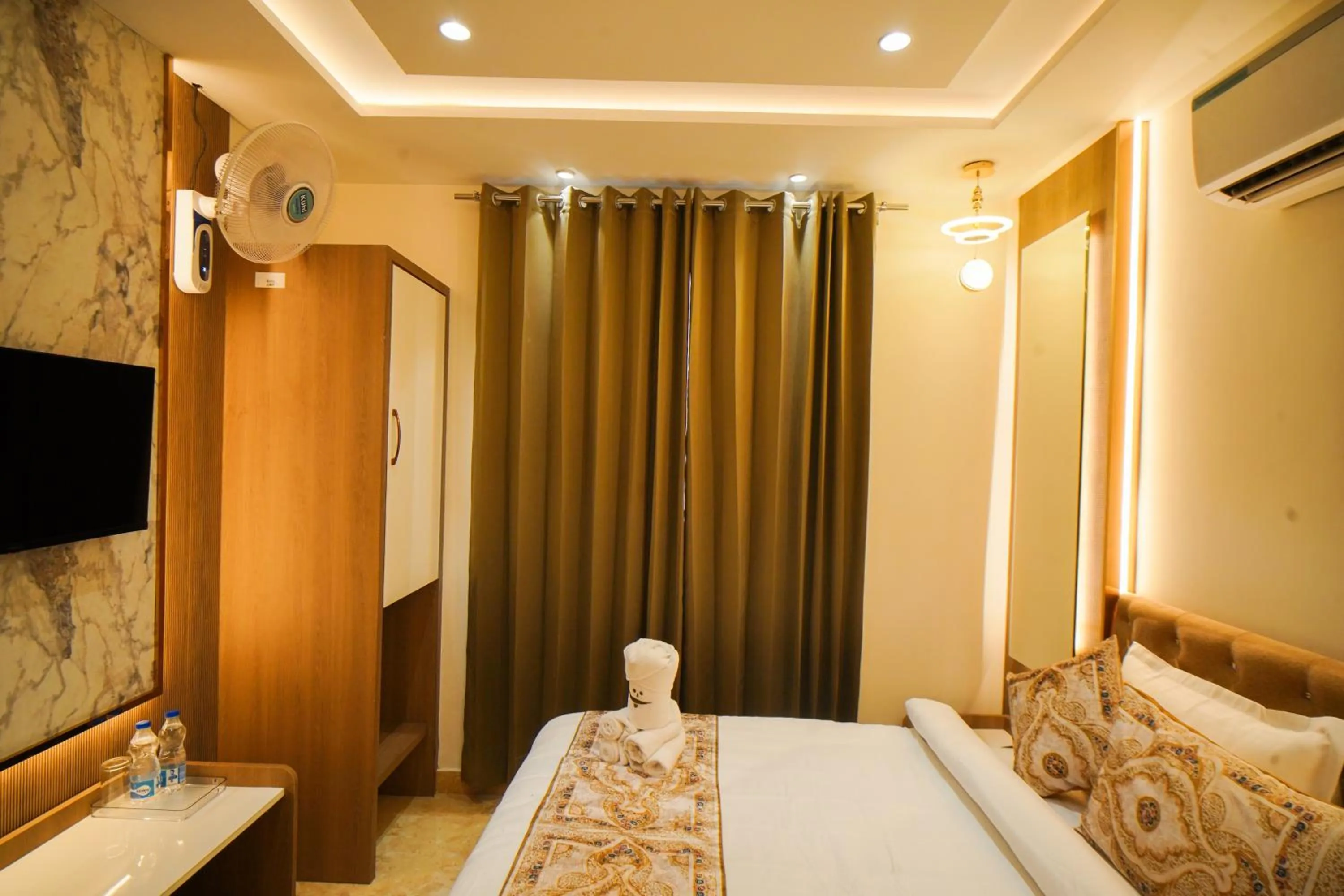 Bed in Hotel Ammison Inn & Suites