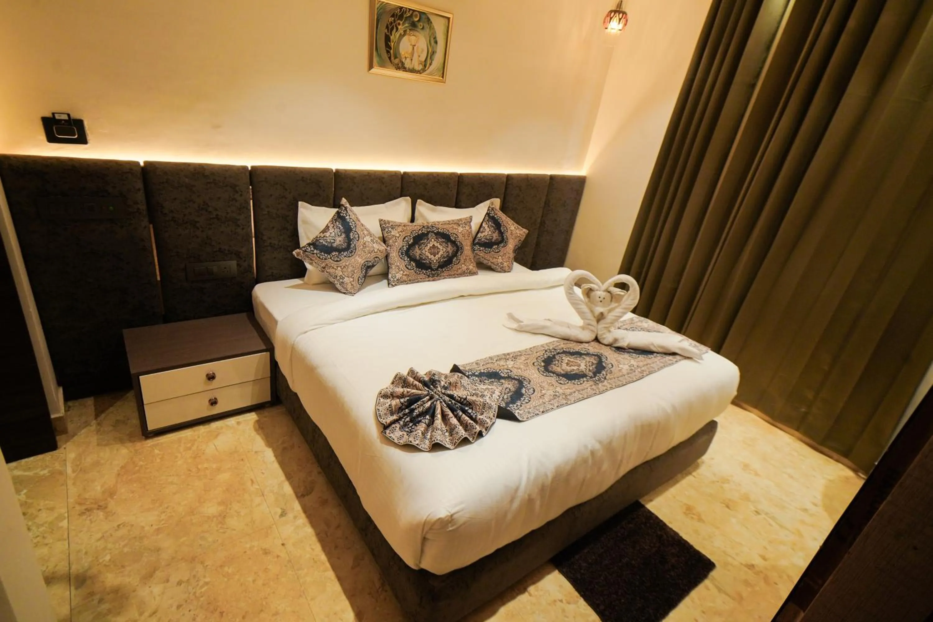 Bed in Hotel Ammison Inn & Suites