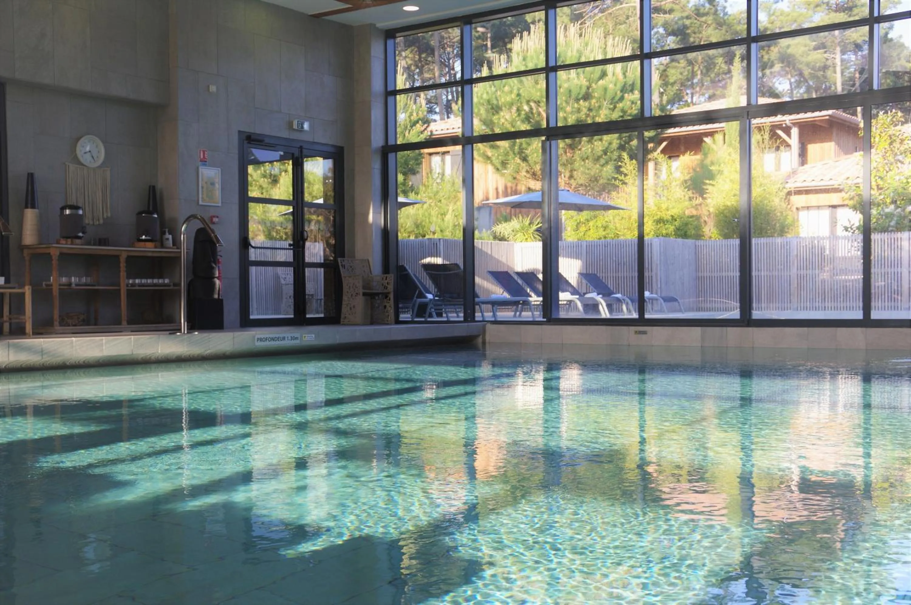 Swimming pool in Domaine du Ferret Restaurant & Spa