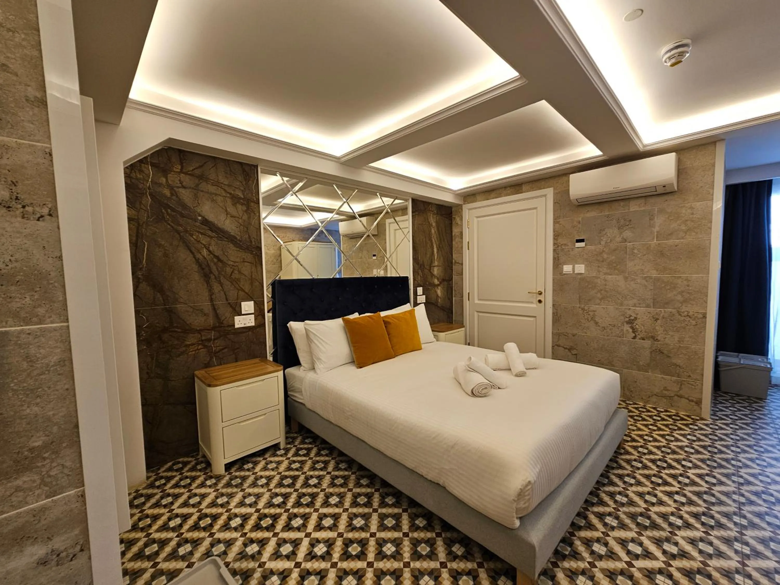 Bed in Balcony Hotel