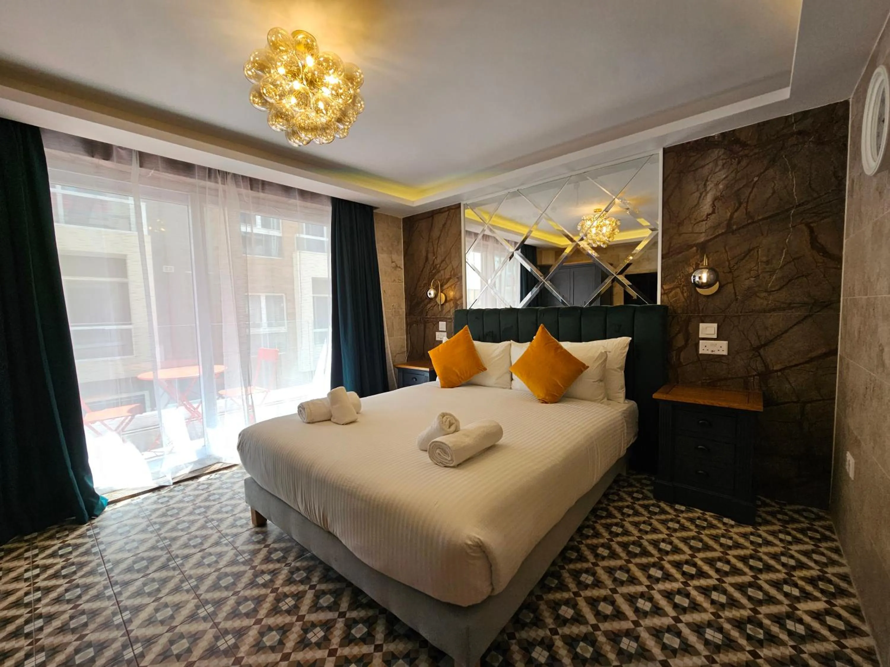 Bed in Balcony Hotel