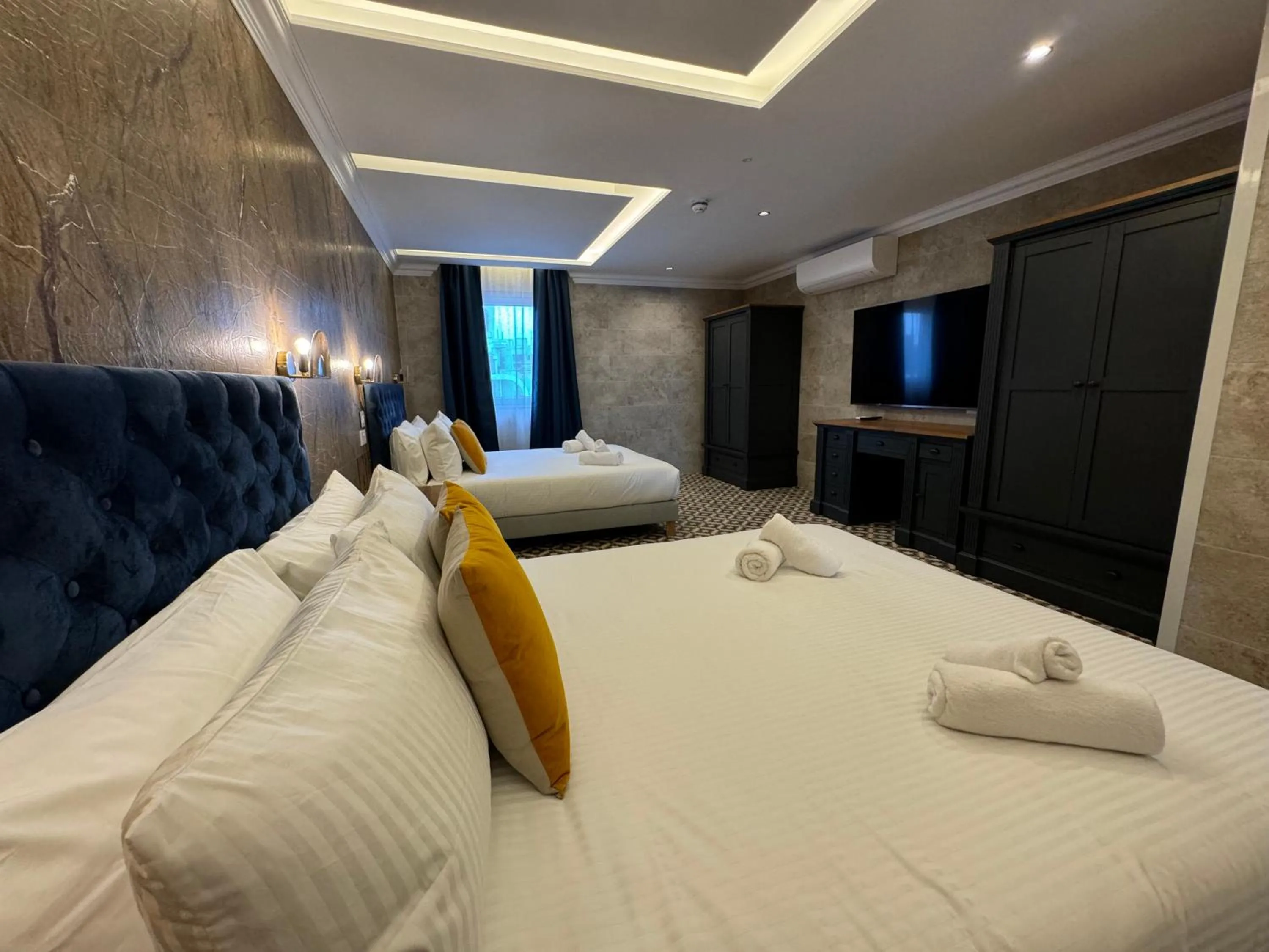 Bed in Balcony Hotel