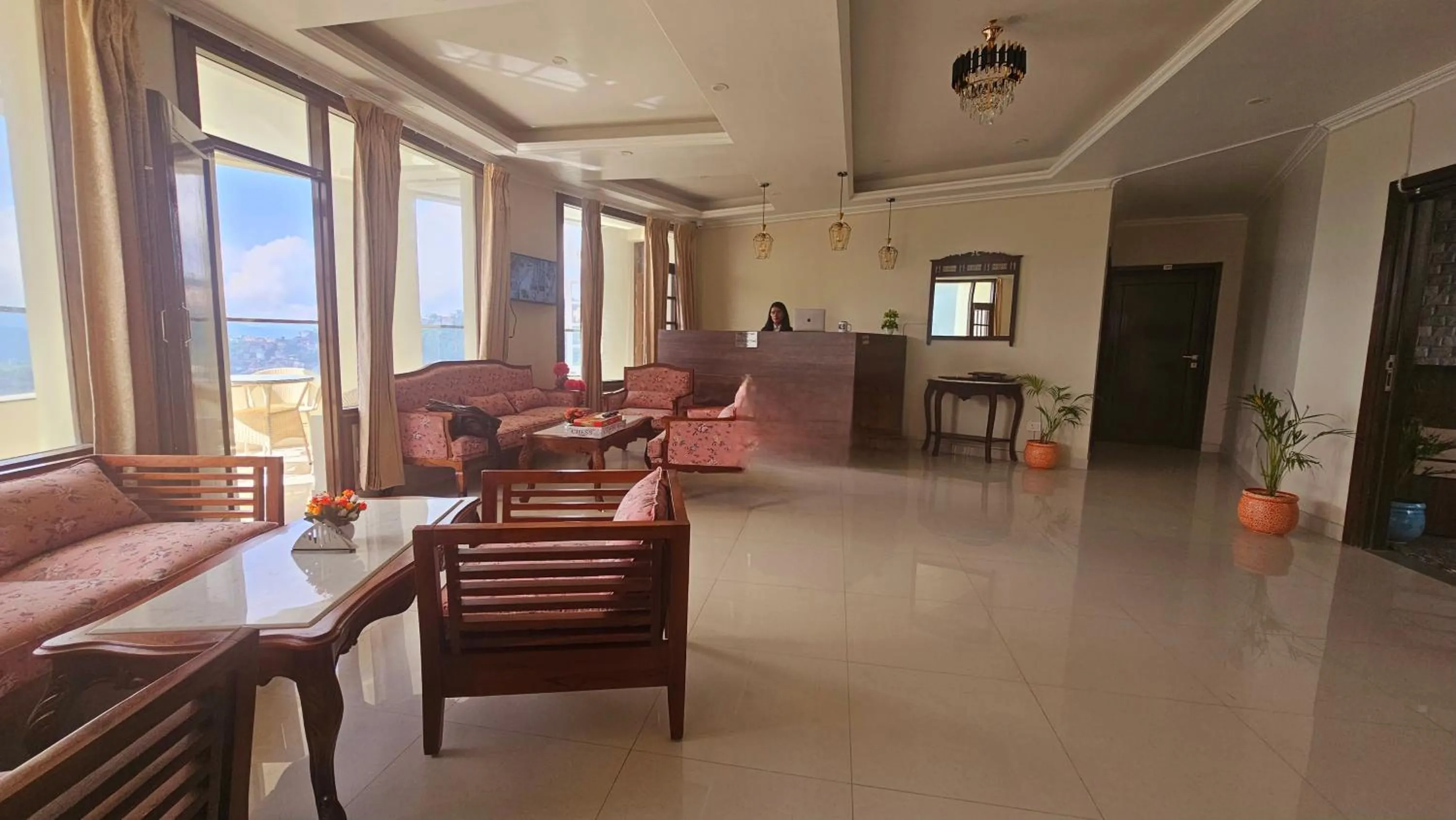 Lobby or reception in Hydrangea Heights by PTW Hotels