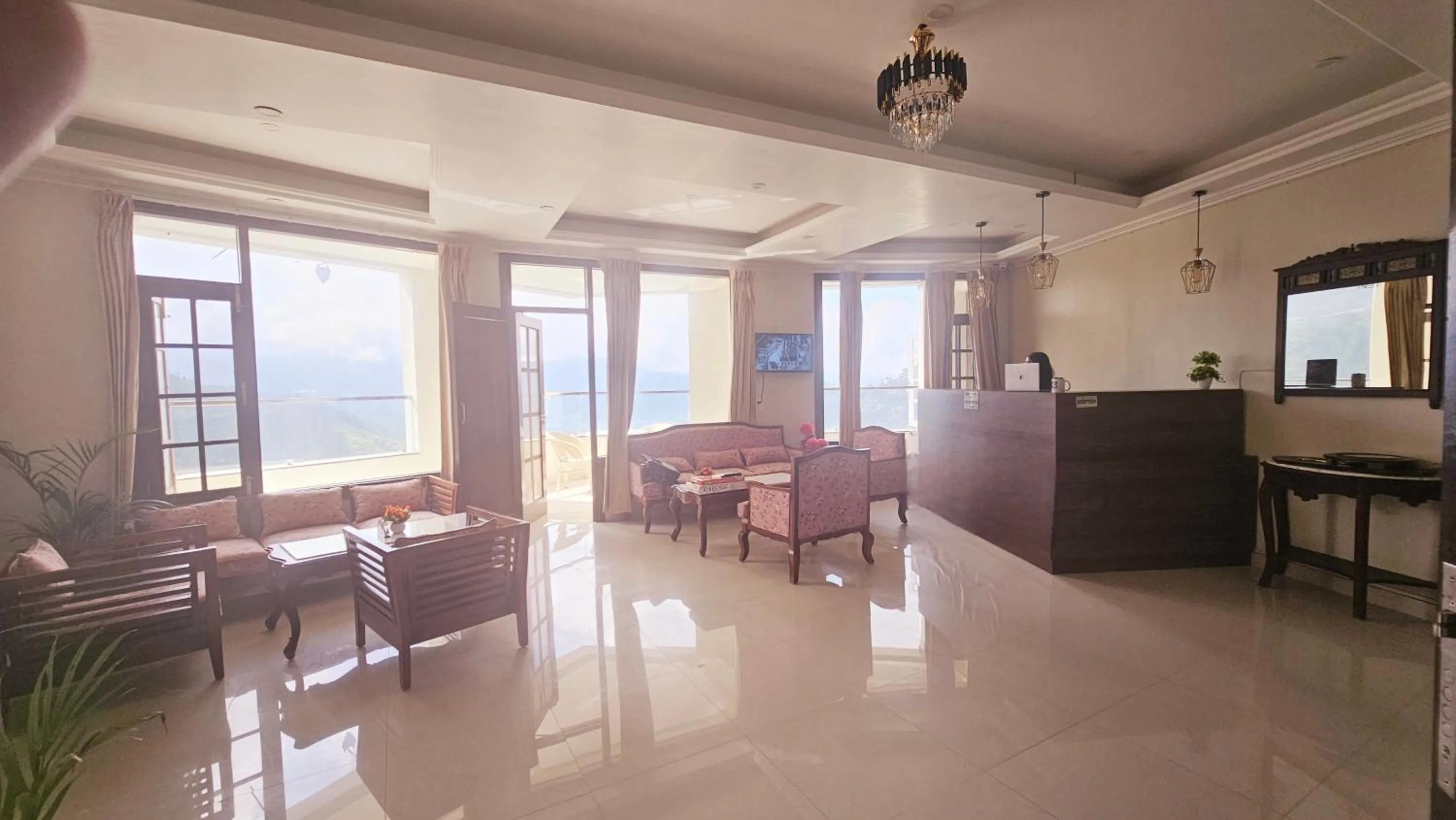 Lobby or reception in Hydrangea Heights by PTW Hotels