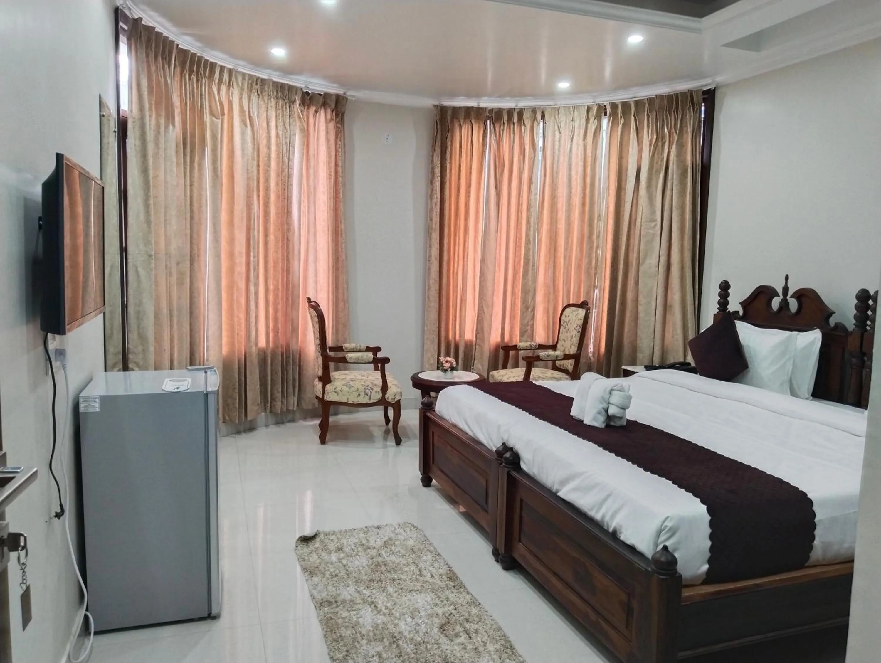 Bed in Hydrangea Heights by PTW Hotels