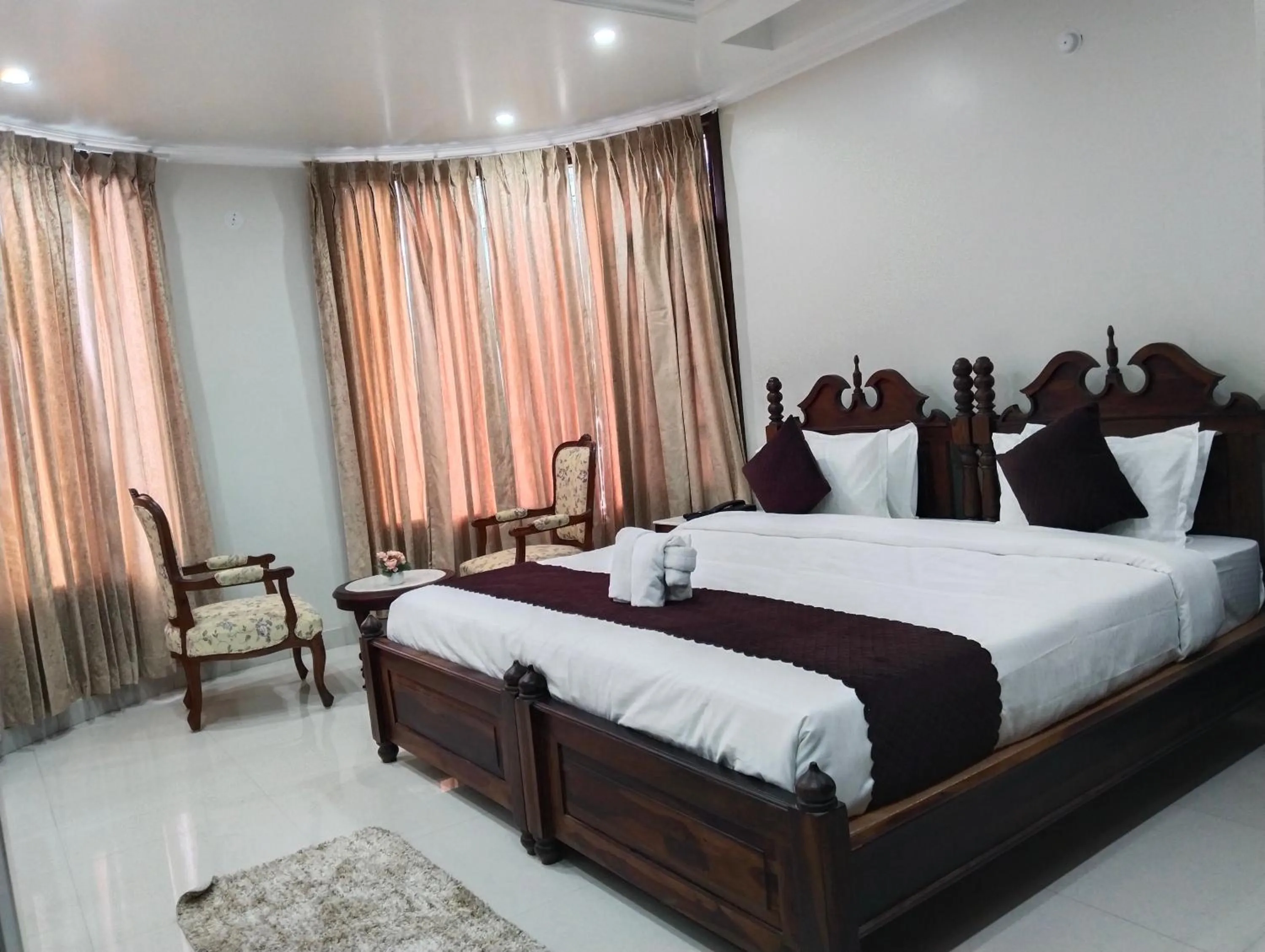 Bed in Hydrangea Heights by PTW Hotels