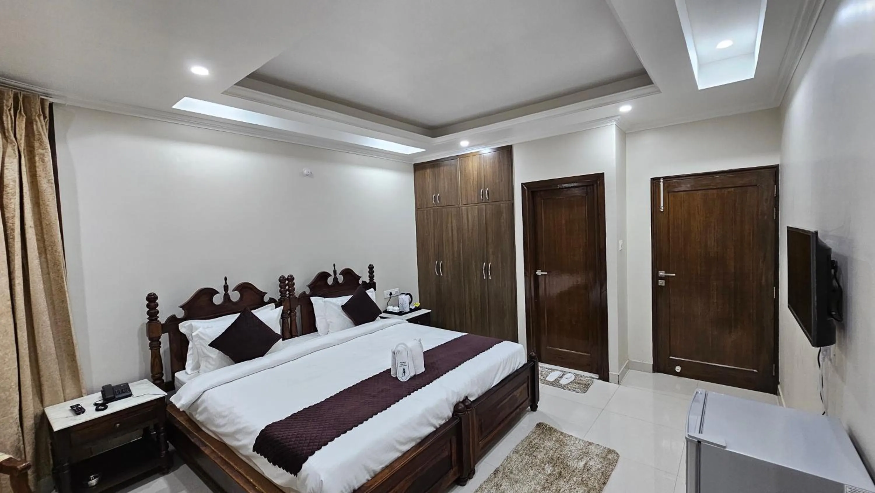 Bed in Hydrangea Heights by PTW Hotels