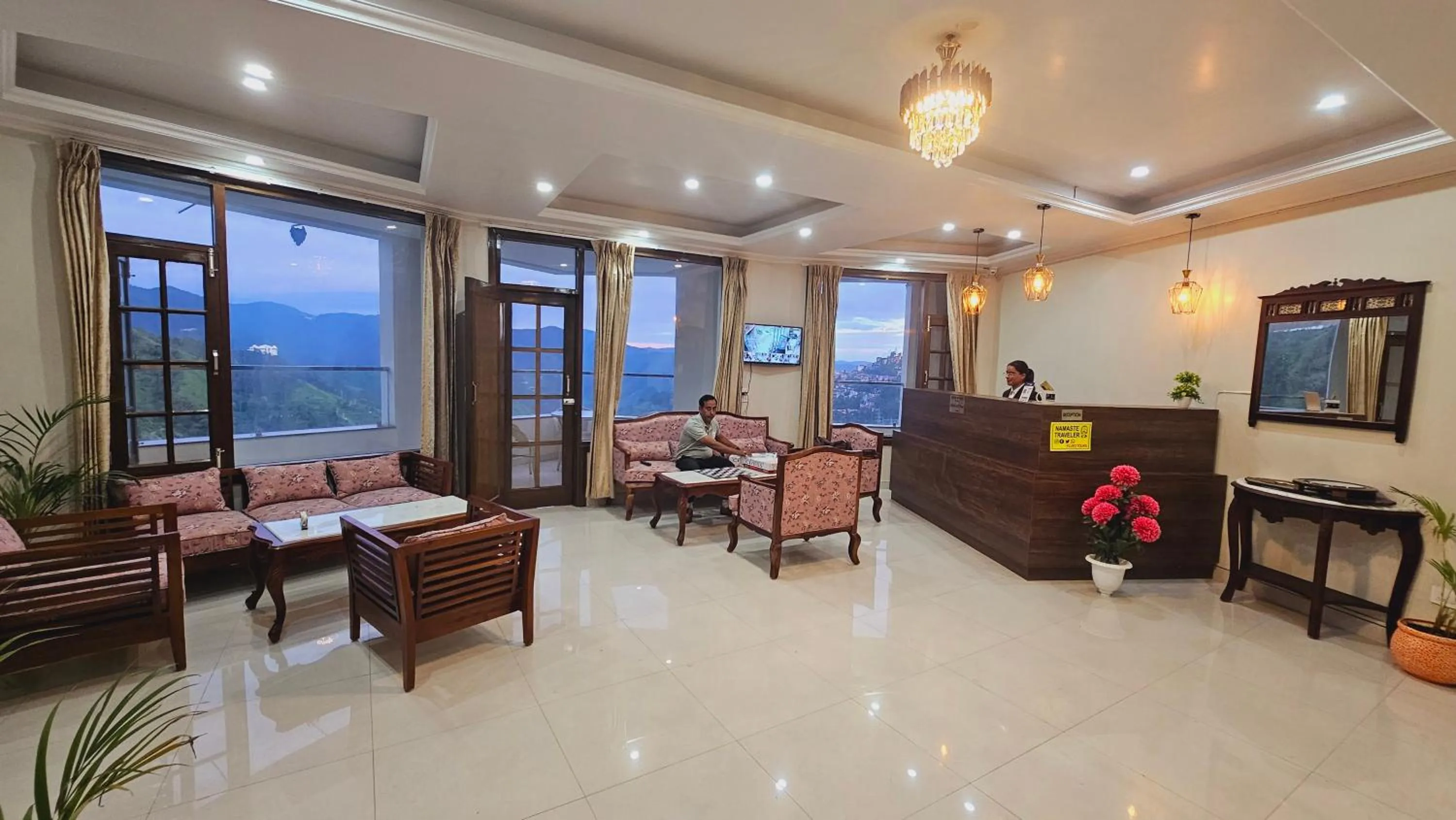 Lobby or reception in Hydrangea Heights by PTW Hotels