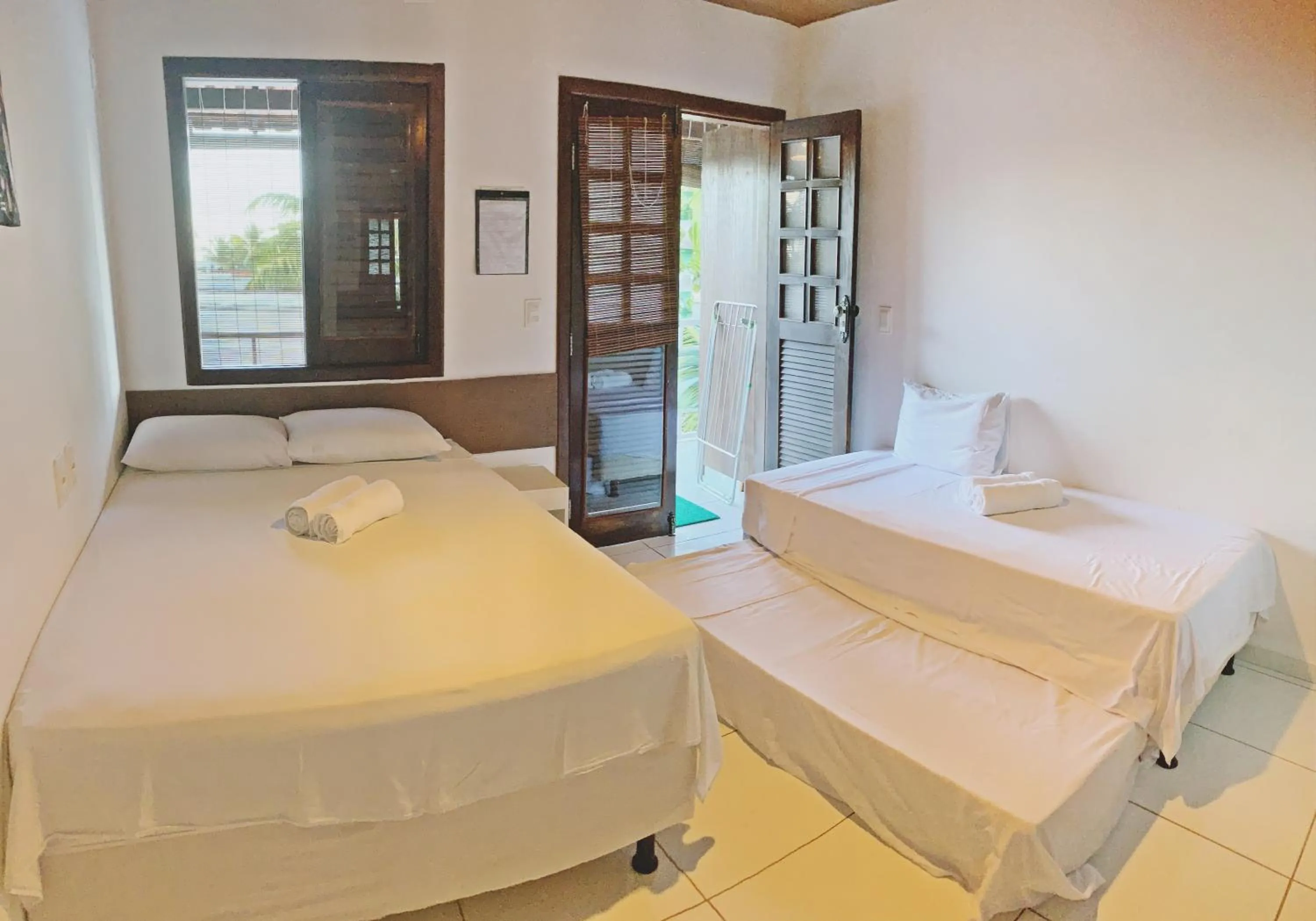 Photo of the whole room, Bed in Pousada Brasil Caribe