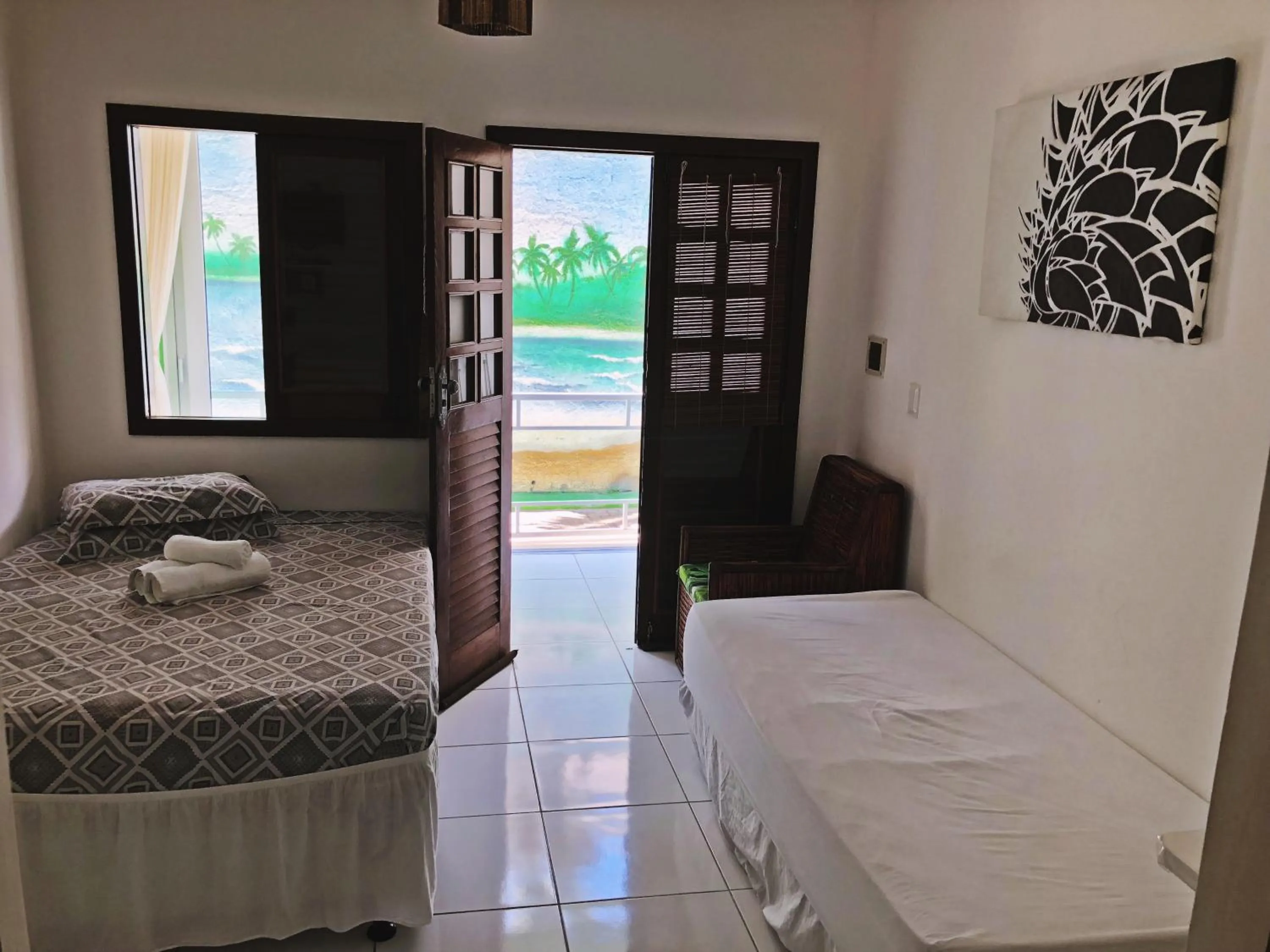 Photo of the whole room, Bed in Pousada Brasil Caribe