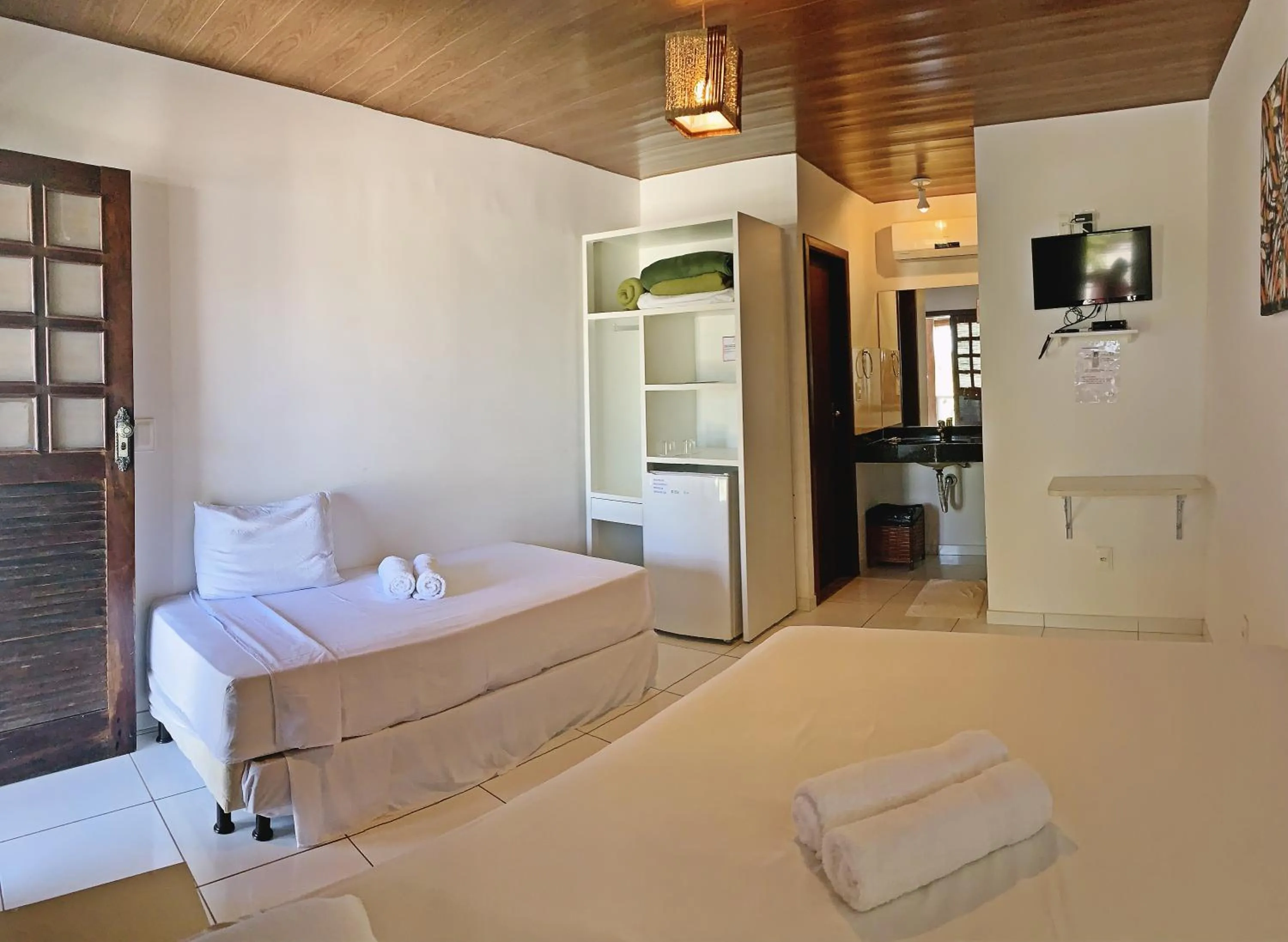 Photo of the whole room, Bed in Pousada Brasil Caribe