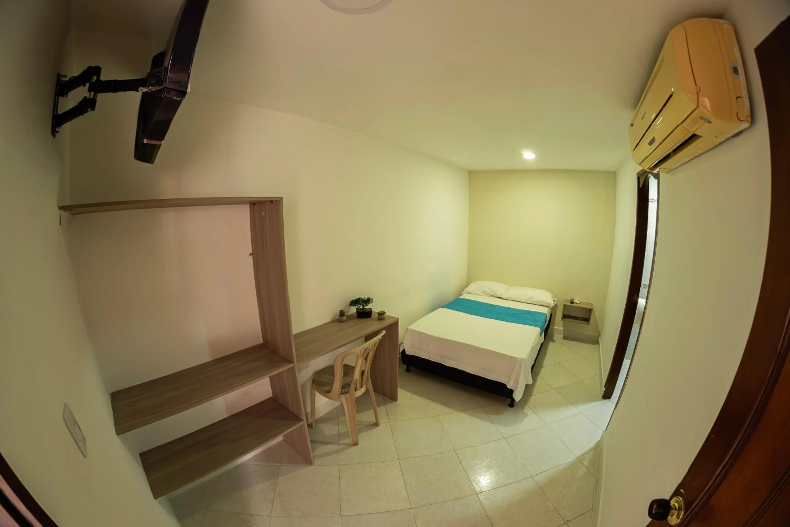 Bed in Hotel Santander Plaza